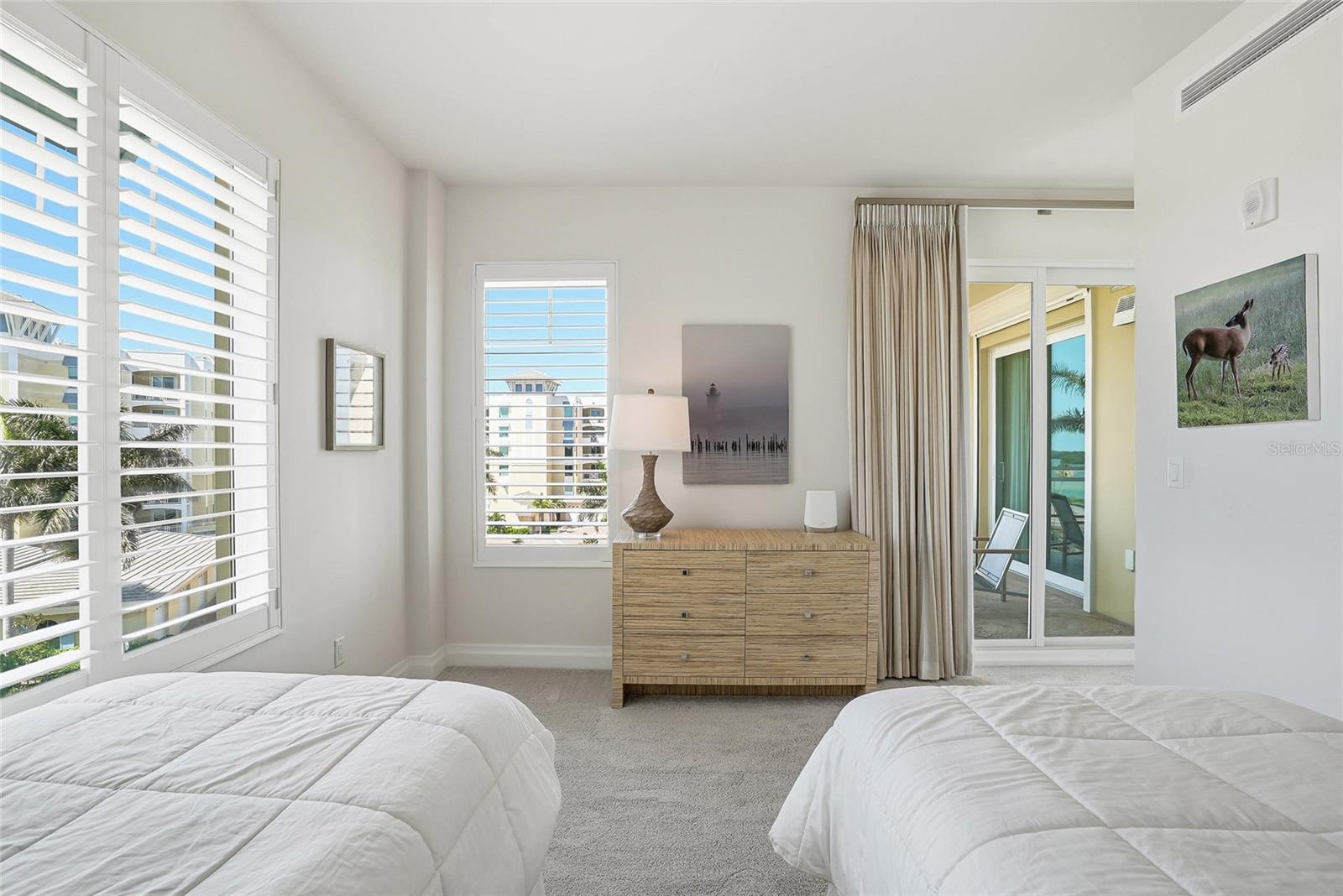Both back bedrooms have balcony #2 access. A cool feature is at nights, you can softly hear the music from Billy's! - 650 COLLANY RD #401, TIERRA VERDE