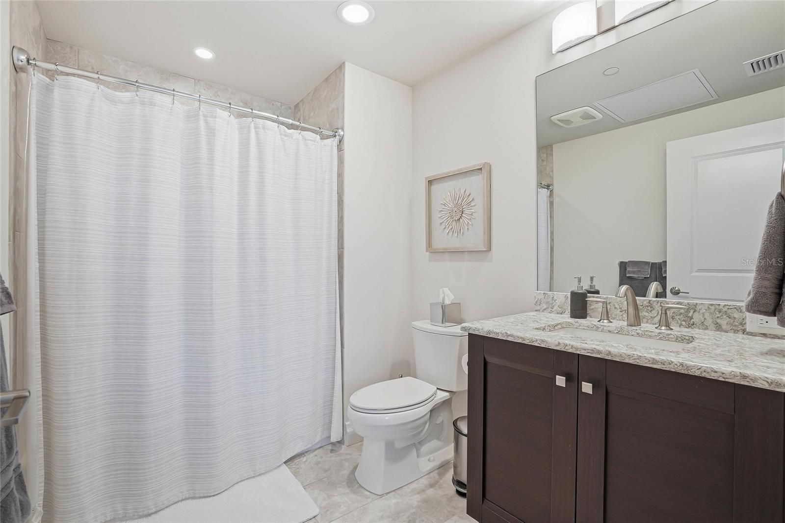 Ensuite bathroom for guest room #2 - 650 COLLANY RD #401, TIERRA VERDE