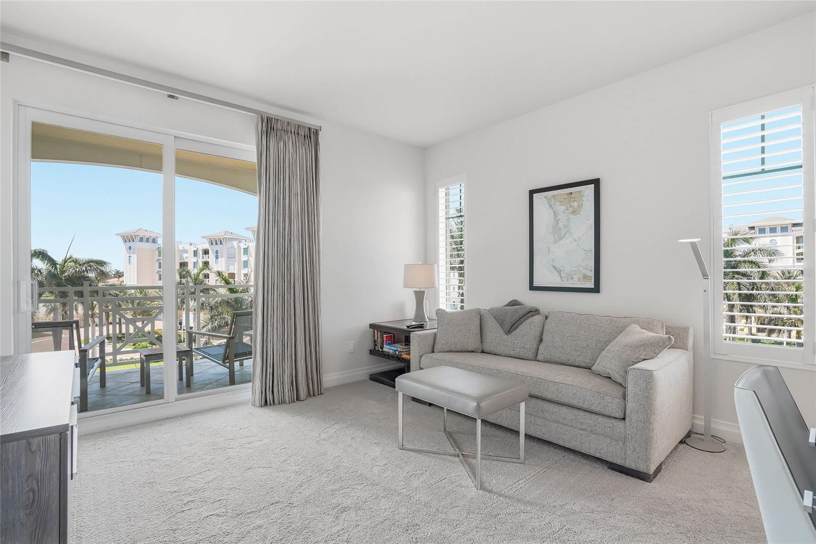 Bedroom #3 is used as an office/extra sleeping area with a sleeper sofa. - 650 COLLANY RD #401, TIERRA VERDE