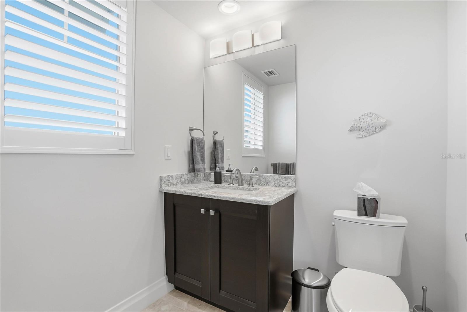 Ensuite bathroom for bedroom #3 with shower. - 650 COLLANY RD #401, TIERRA VERDE