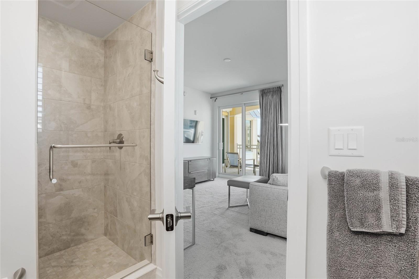 Walk-in shower in ensuite bath for bedroom #3. - 650 COLLANY RD #401, TIERRA VERDE
