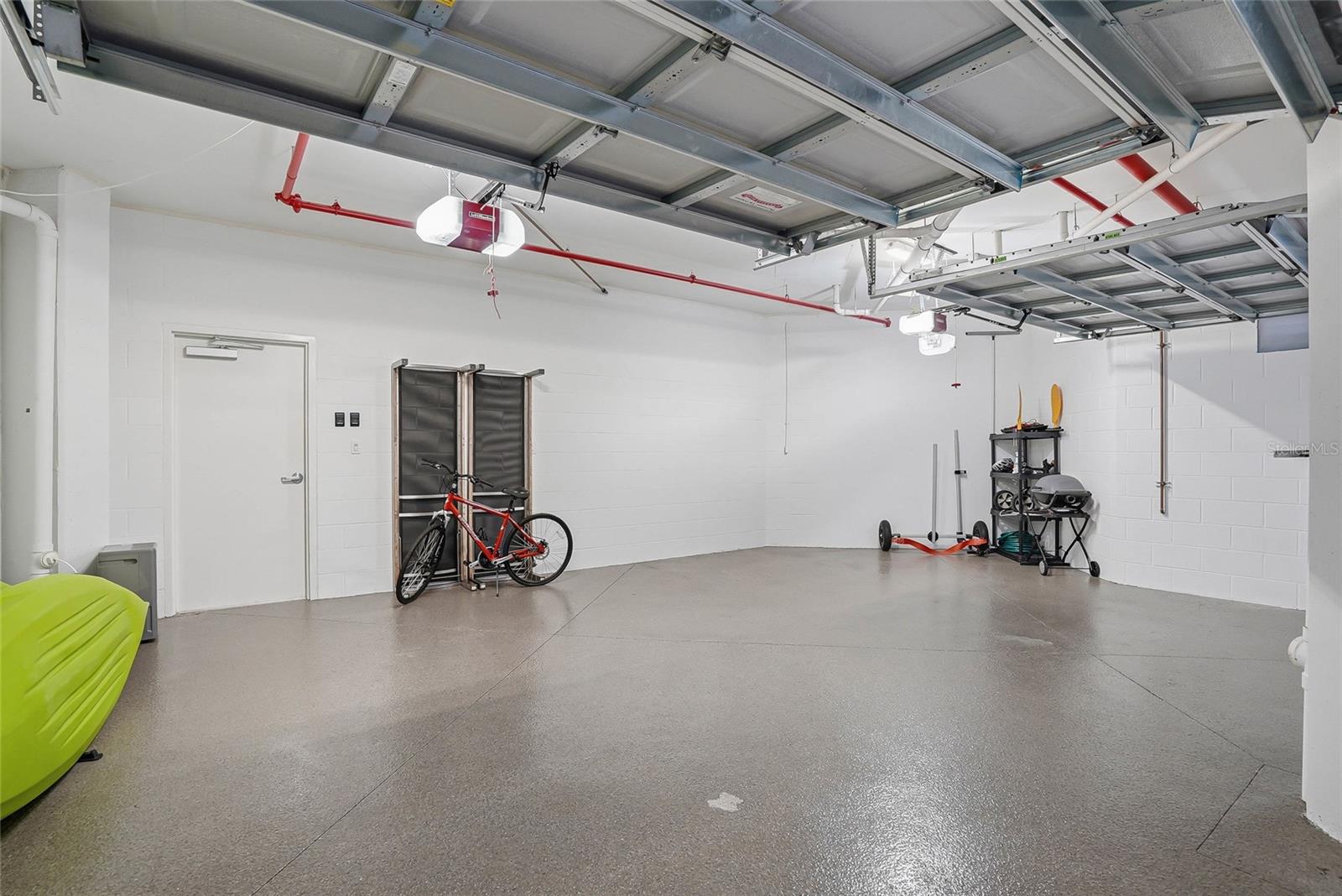 The garage is oversized with additional space for kayaks and bikes. - 650 COLLANY RD #401, TIERRA VERDE