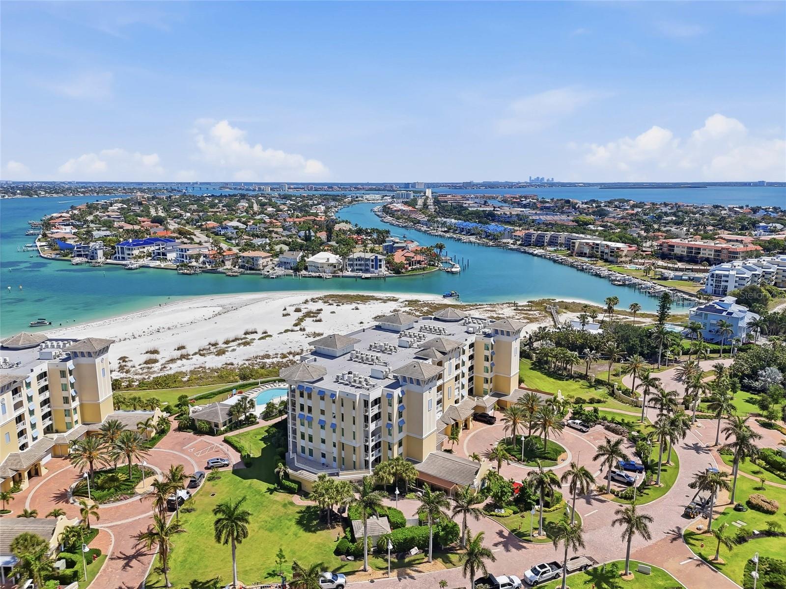Aerial view showcasing waterfront setting + a view of the Grand Canal on Tierra Verde! - 650 COLLANY RD #401, TIERRA VERDE