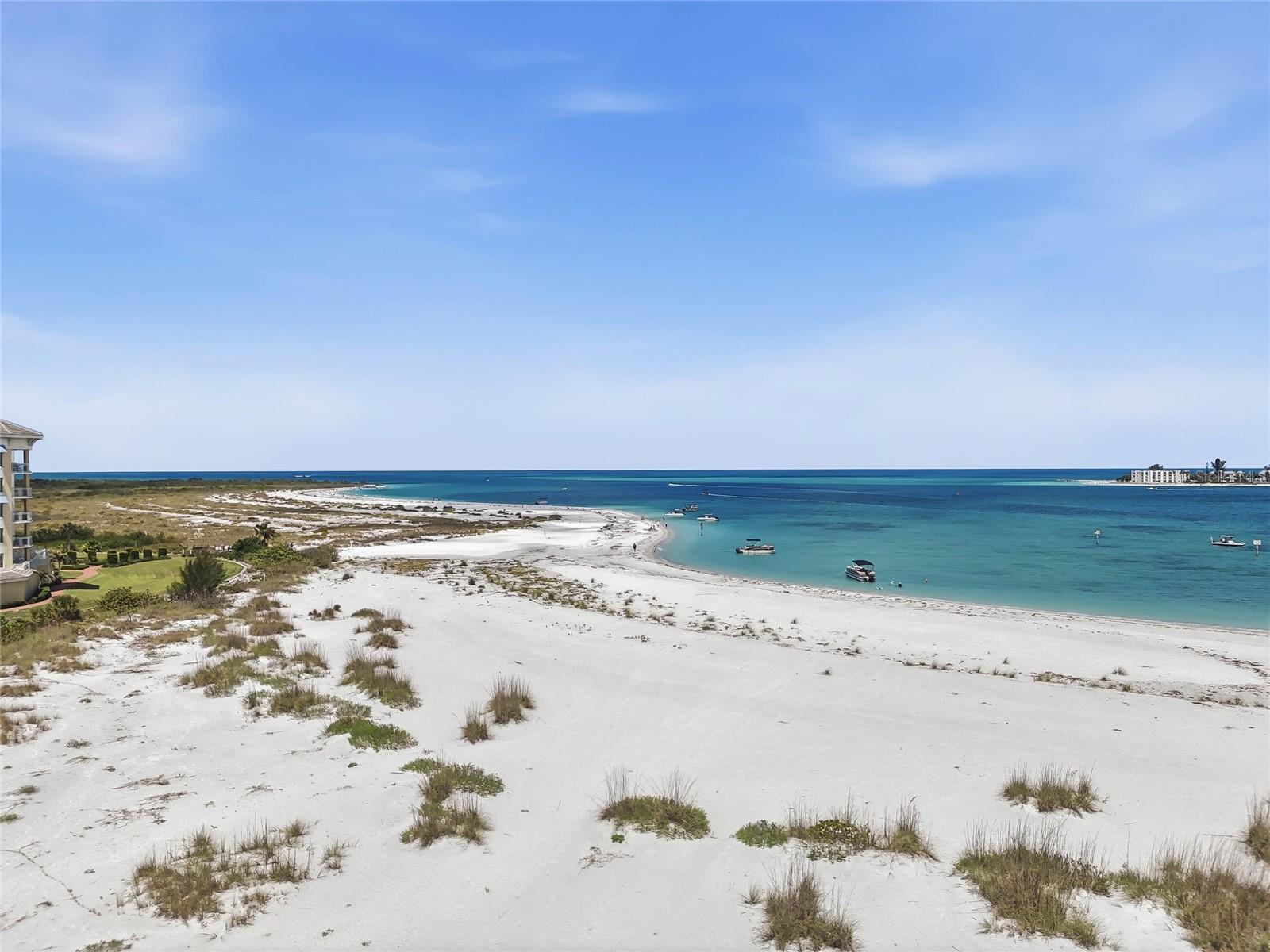I love the sandy white beach and the ability to get into the water in the shallow areas! - 650 COLLANY RD #401, TIERRA VERDE