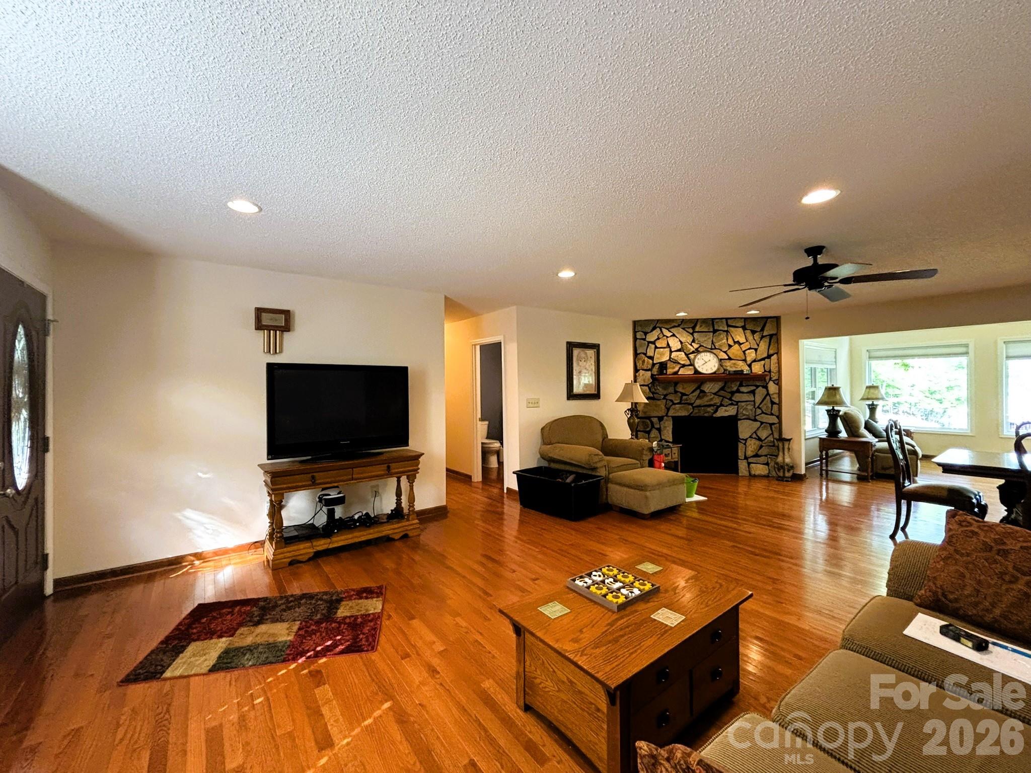 Living Room with Fireplace - 130 Canoe Court, Mount Gilead