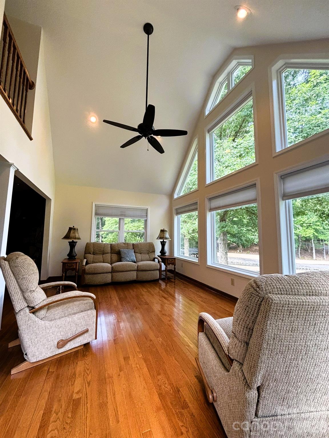 Floor to Ceiling windows facing Lake Tillery, Living Room - 130 Canoe Court, Mount Gilead