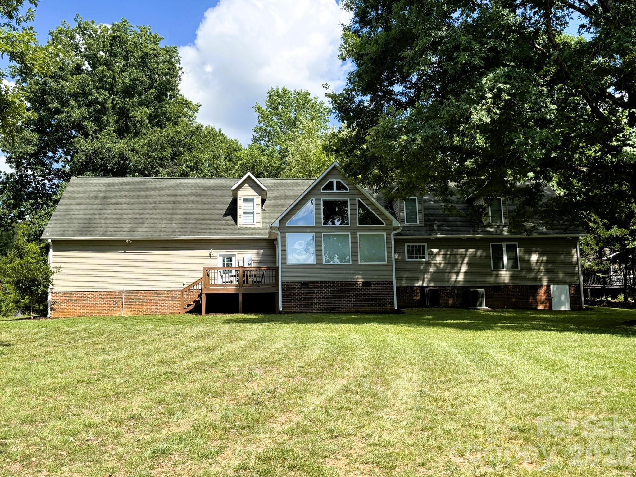 Back of the home, facing Lake Tillery - 130 Canoe Court, Mount Gilead