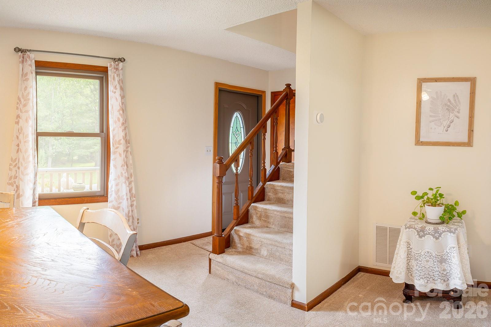 Stairs to the upper 2 bedrooms and full bath - 100 Forest Park Drive, Hendersonville