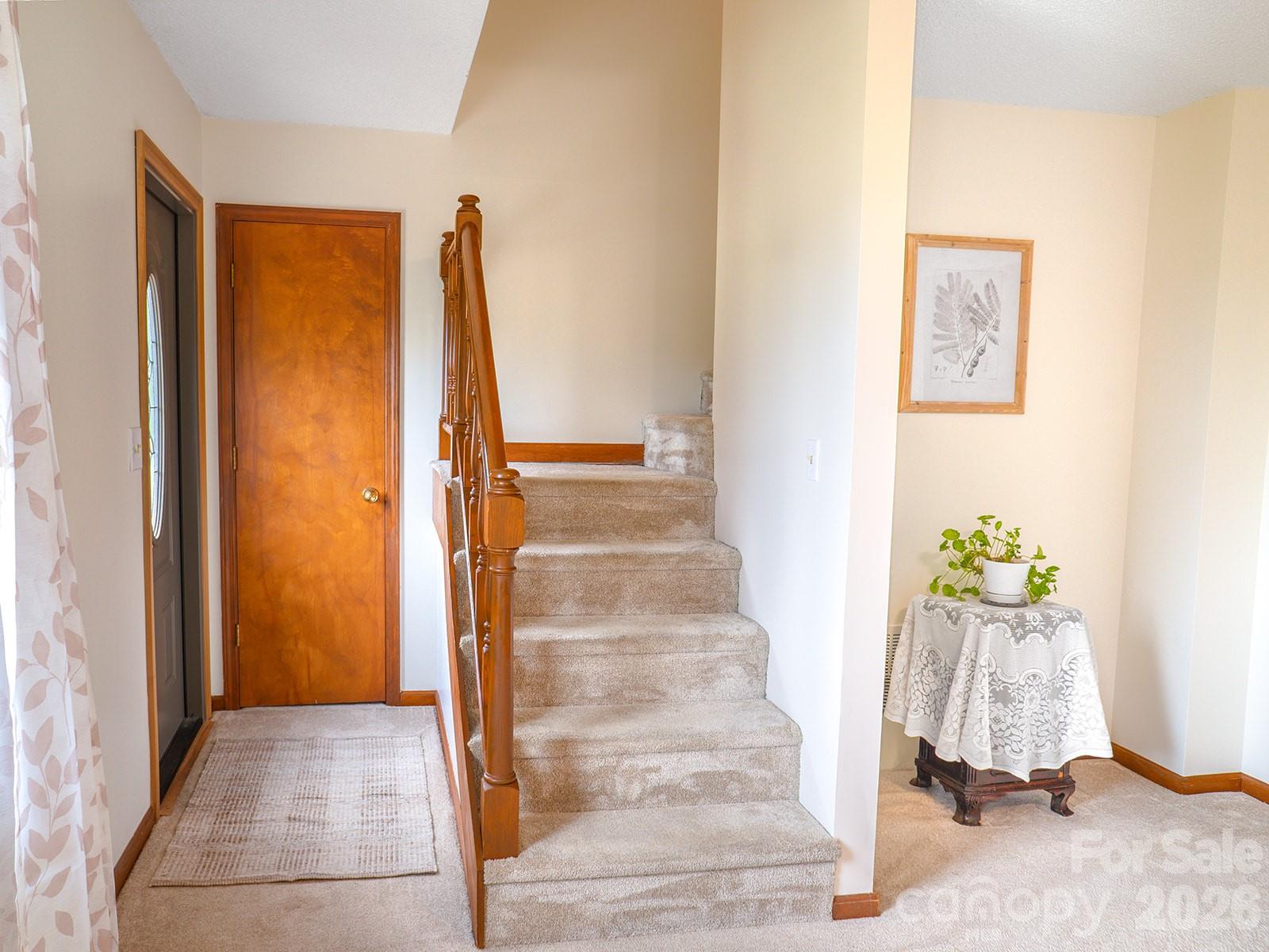 Coat Closet and steps to upper level - 100 Forest Park Drive, Hendersonville