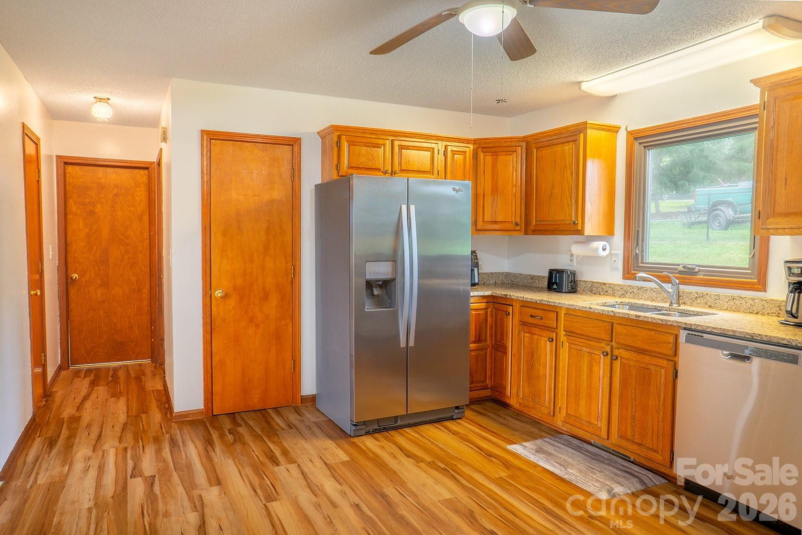 Door to Primary Suite off kitchen - 100 Forest Park Drive, Hendersonville
