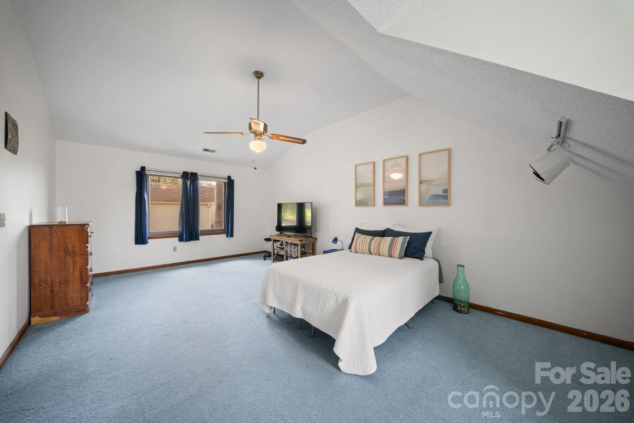 Another large bedroom on the upper level, also with dormer and window seat. - 100 Forest Park Drive, Hendersonville