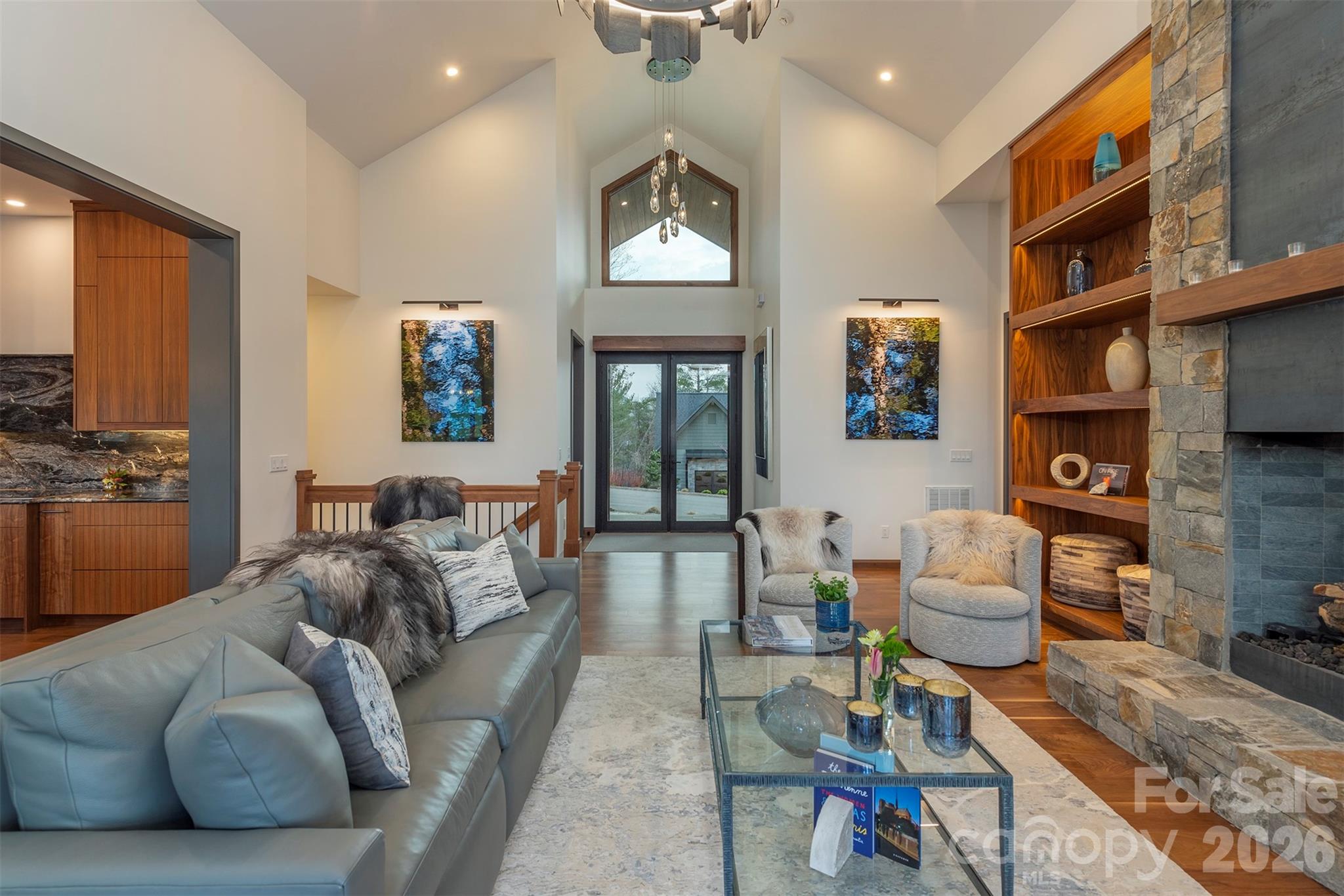 Views from front entrance with electronic blinds for privacy - 158 Riverbend Forest Drive, Asheville
