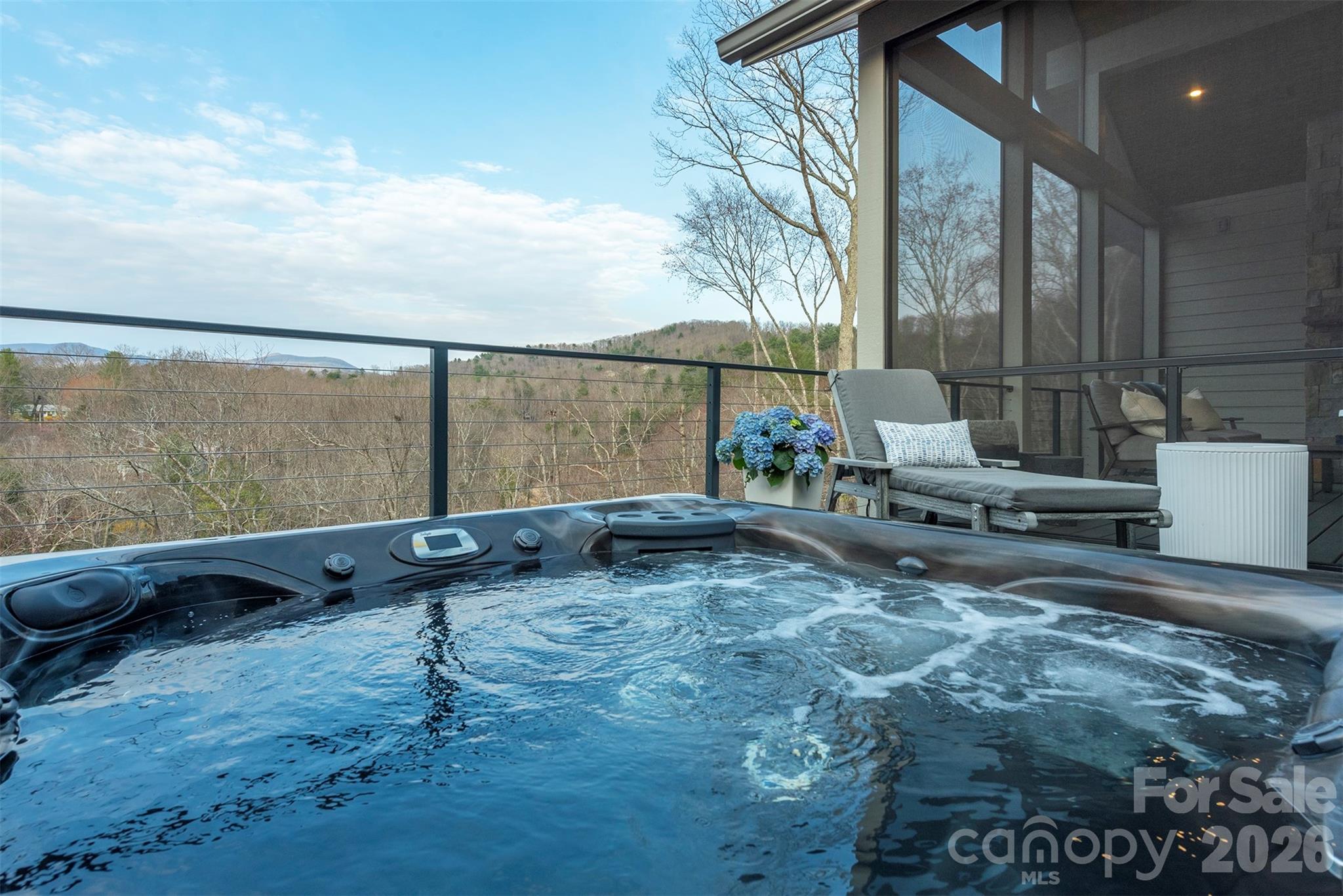 Relax in your hottub with access from the primary suite or main level with privacy screen and mountain views - 158 Riverbend Forest Drive, Asheville
