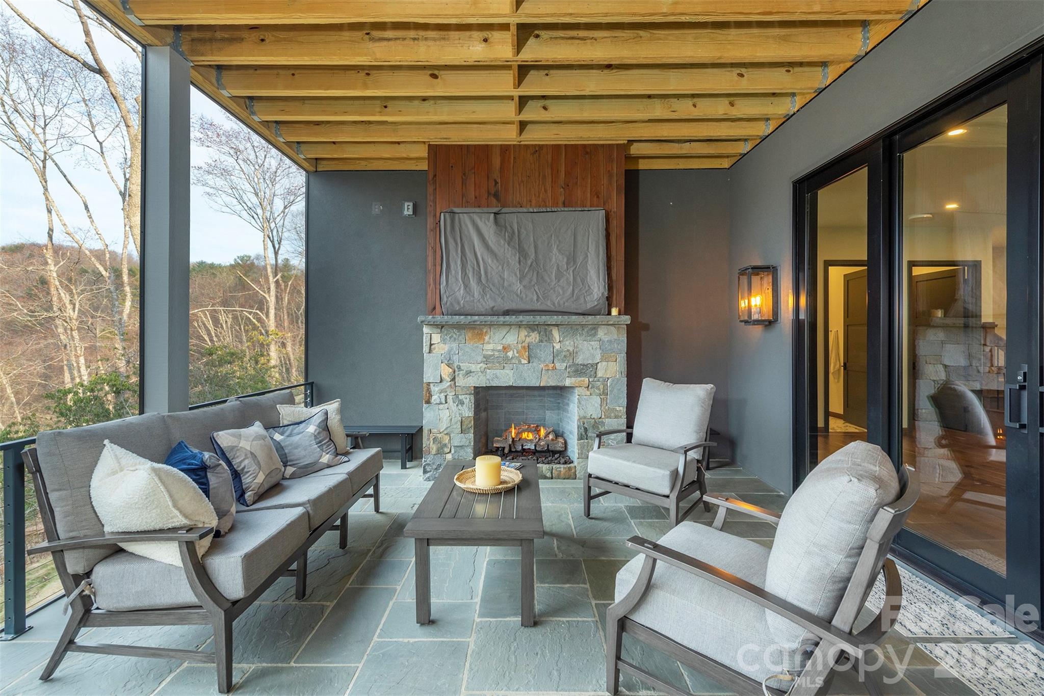 Lower level deck with gas firepace - 158 Riverbend Forest Drive, Asheville