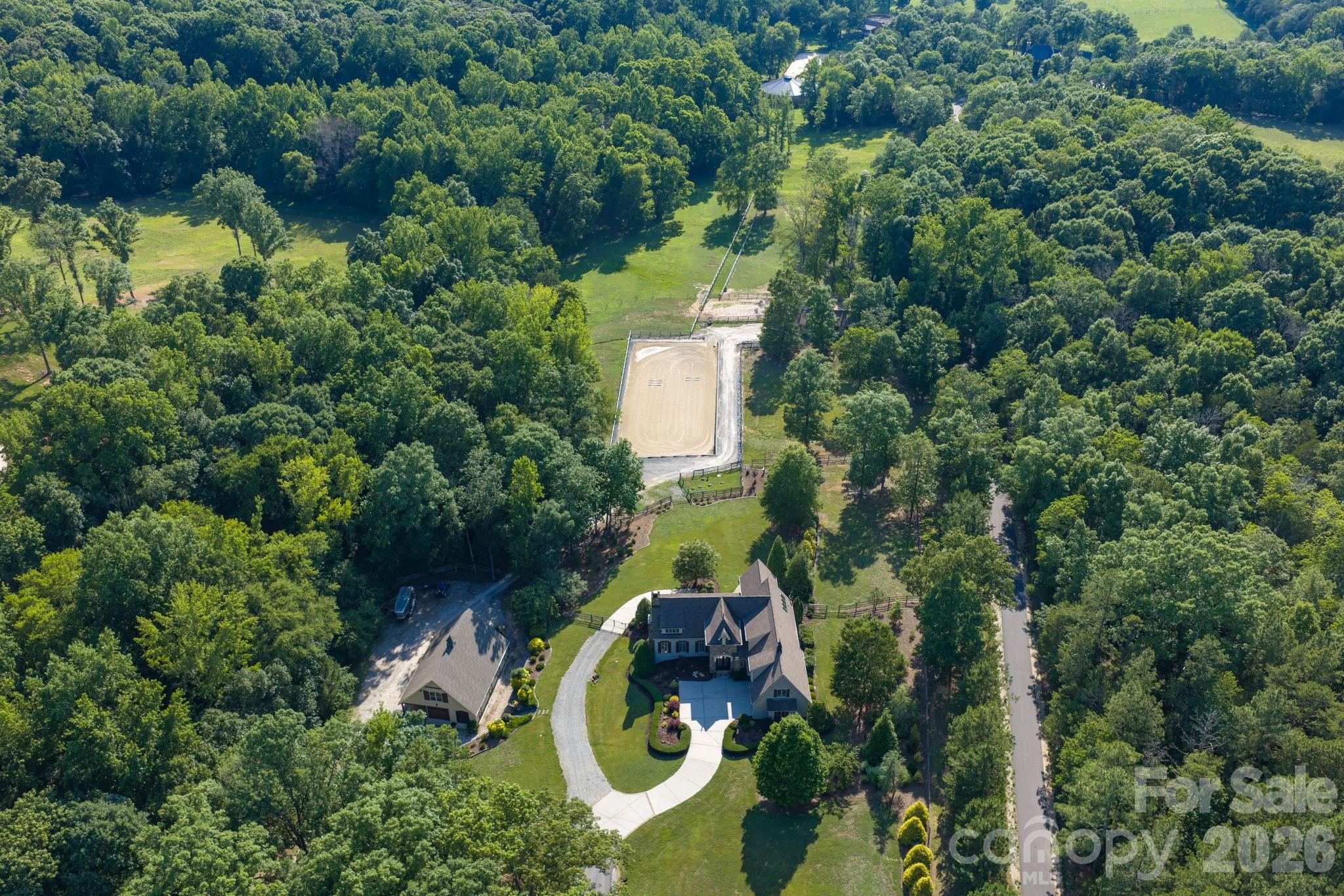 Current owners graded and cleared additional pasture area, installed extensive drainage systems and drive to new barn - 8528 Waxhaw Creek Road, Waxhaw
