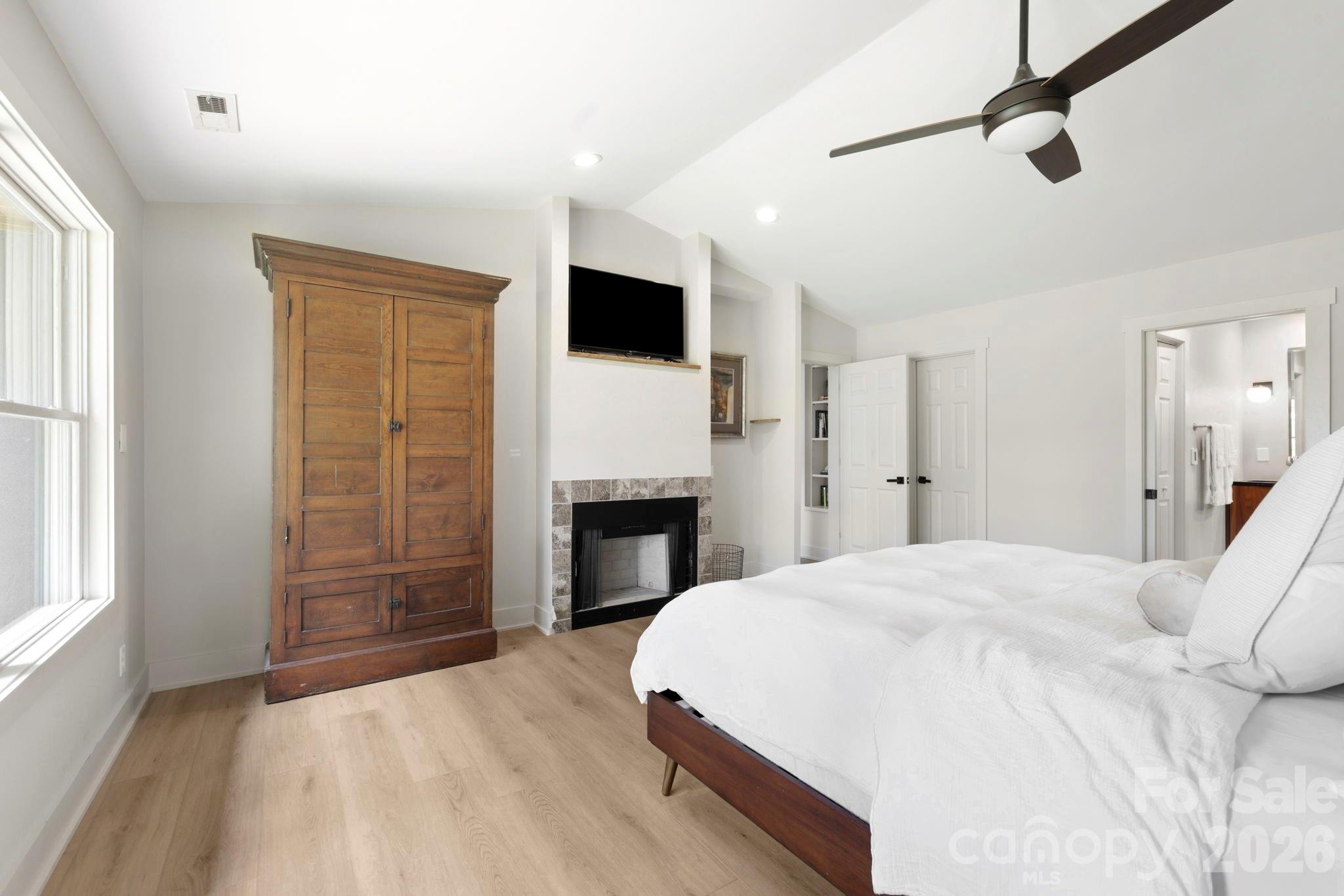 Primary bedroom with walk-in closet - 114 Cane Creek Ranch Drive, Fletcher