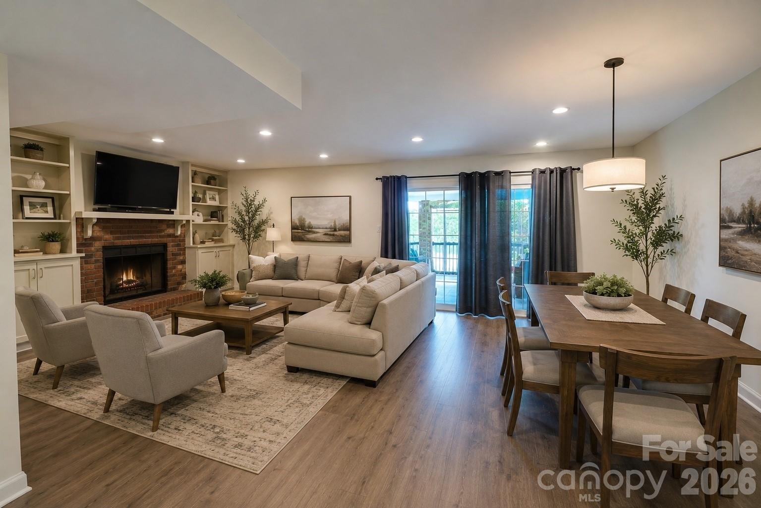 Virtually staged living and dining room combo - 2705 N Center Street, Hickory