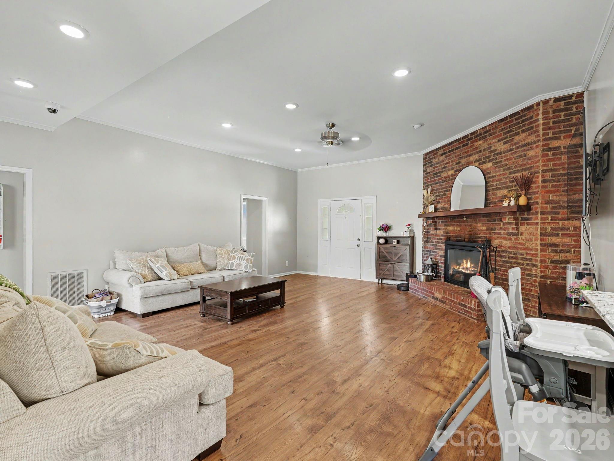 Living Room with Wood Burning Fireplace - 8301 Mooresville Road, Concord