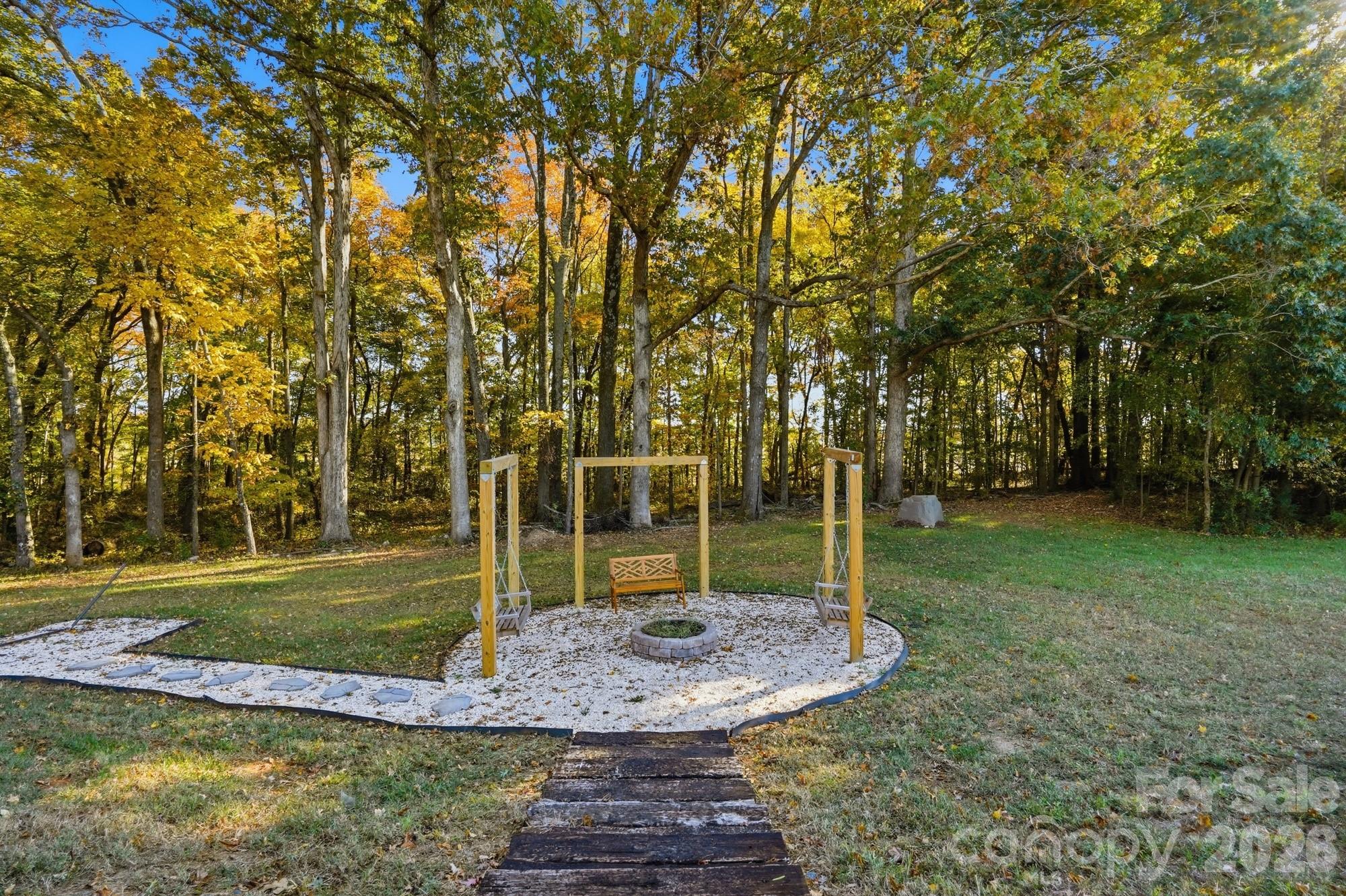 Custom Built Fire Pit and Swing/Hammock Area - 4105 Parkwood School Road, Monroe