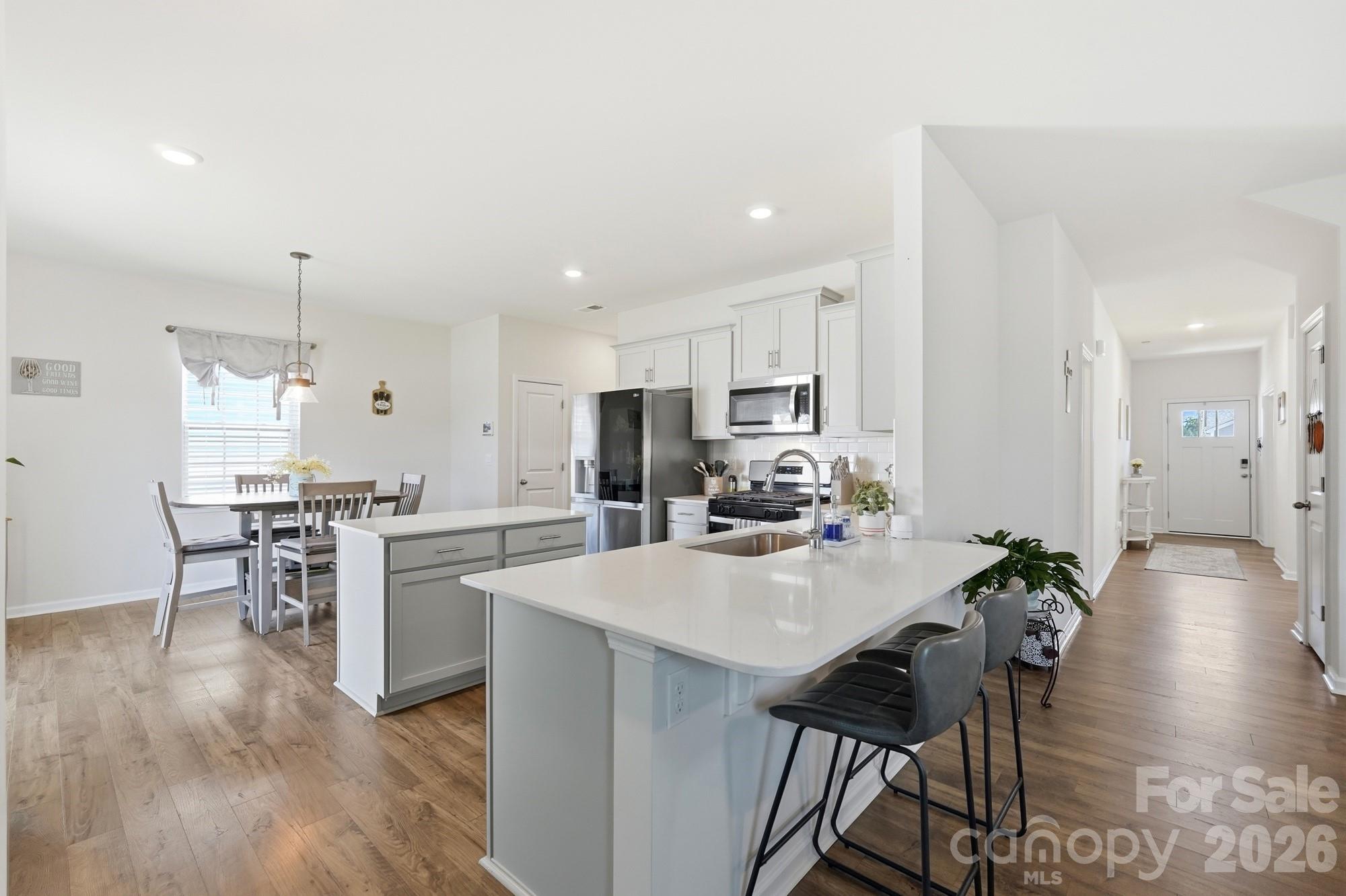 The heart of the home begins here with a spacious island and open-concept design. - 170 Giant Oak Avenue, Statesville