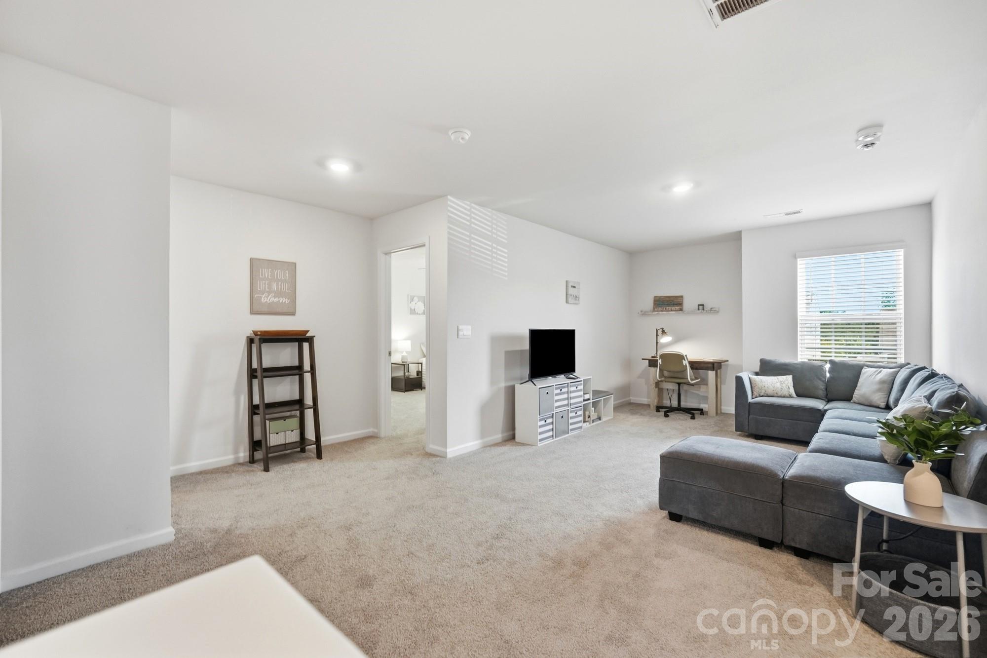 Thoughtfully designed spaces flow seamlessly throughout the main level. - 170 Giant Oak Avenue, Statesville