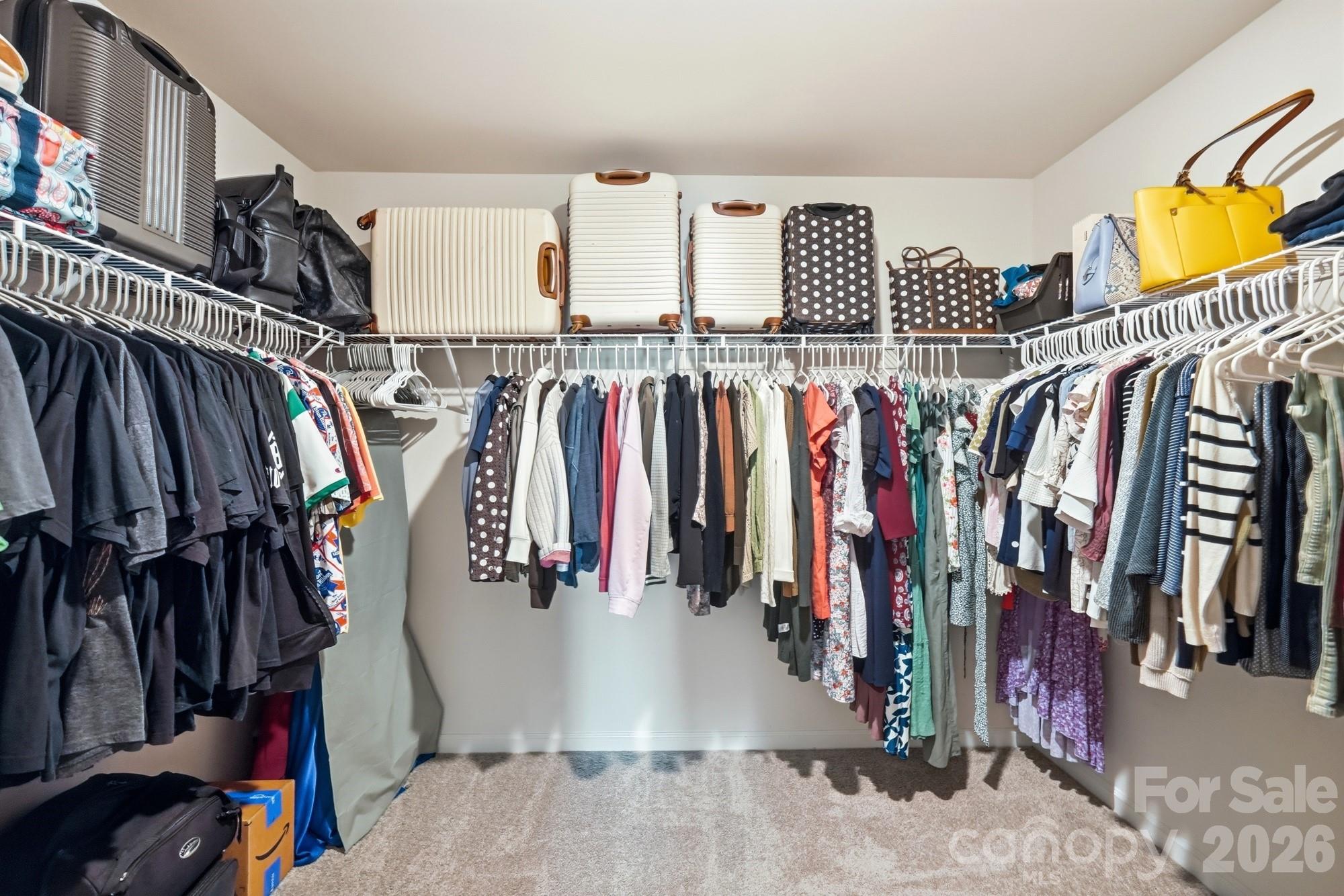 A dream-sized walk-in closet with space for every season. - 170 Giant Oak Avenue, Statesville