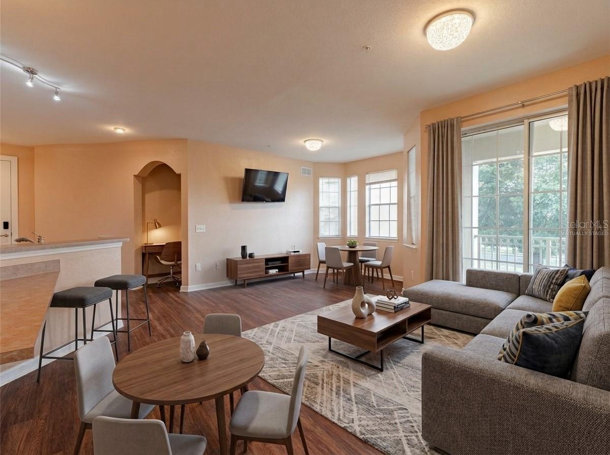 This listing includes virtually staged images created with AI to demonstrate space potential. Fixtures, finishes, and dimensions may not exactly reflect the current state of the property. - 709 TERRACE RIDGE CIR #709, DAVENPORT
