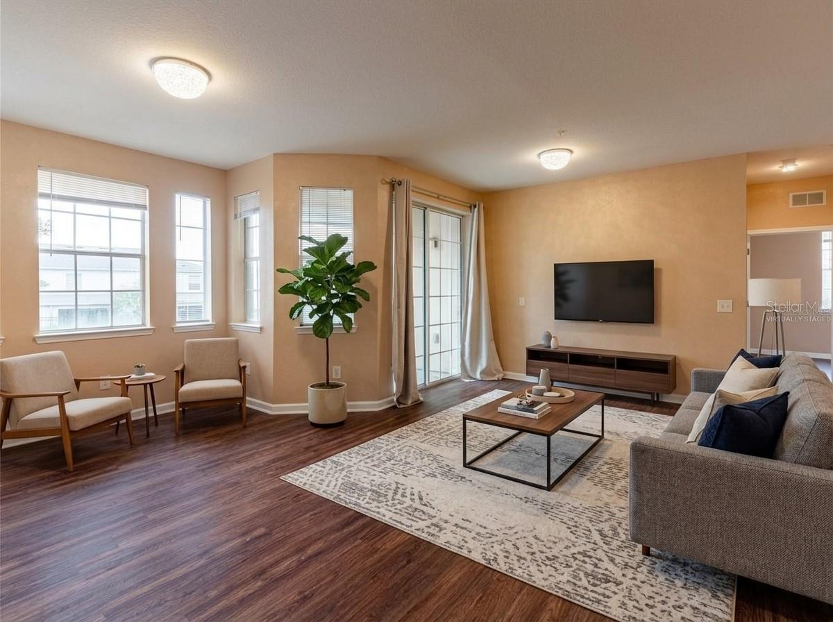 This listing includes virtually staged images created with AI to demonstrate space potential. Fixtures, finishes, and dimensions may not exactly reflect the current state of the property. - 709 TERRACE RIDGE CIR #709, DAVENPORT