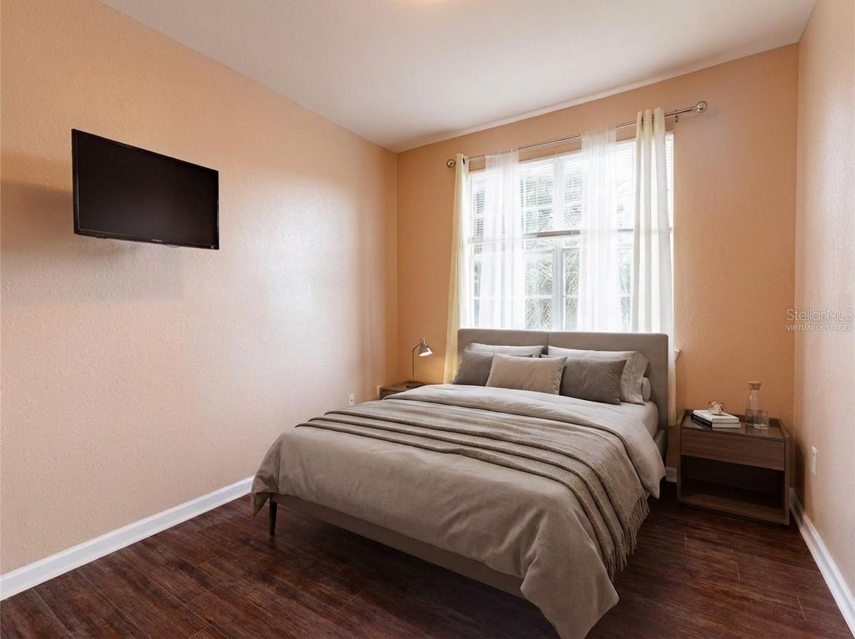 This listing includes virtually staged images created with AI to demonstrate space potential. Fixtures, finishes, and dimensions may not exactly reflect the current state of the property. - 709 TERRACE RIDGE CIR #709, DAVENPORT