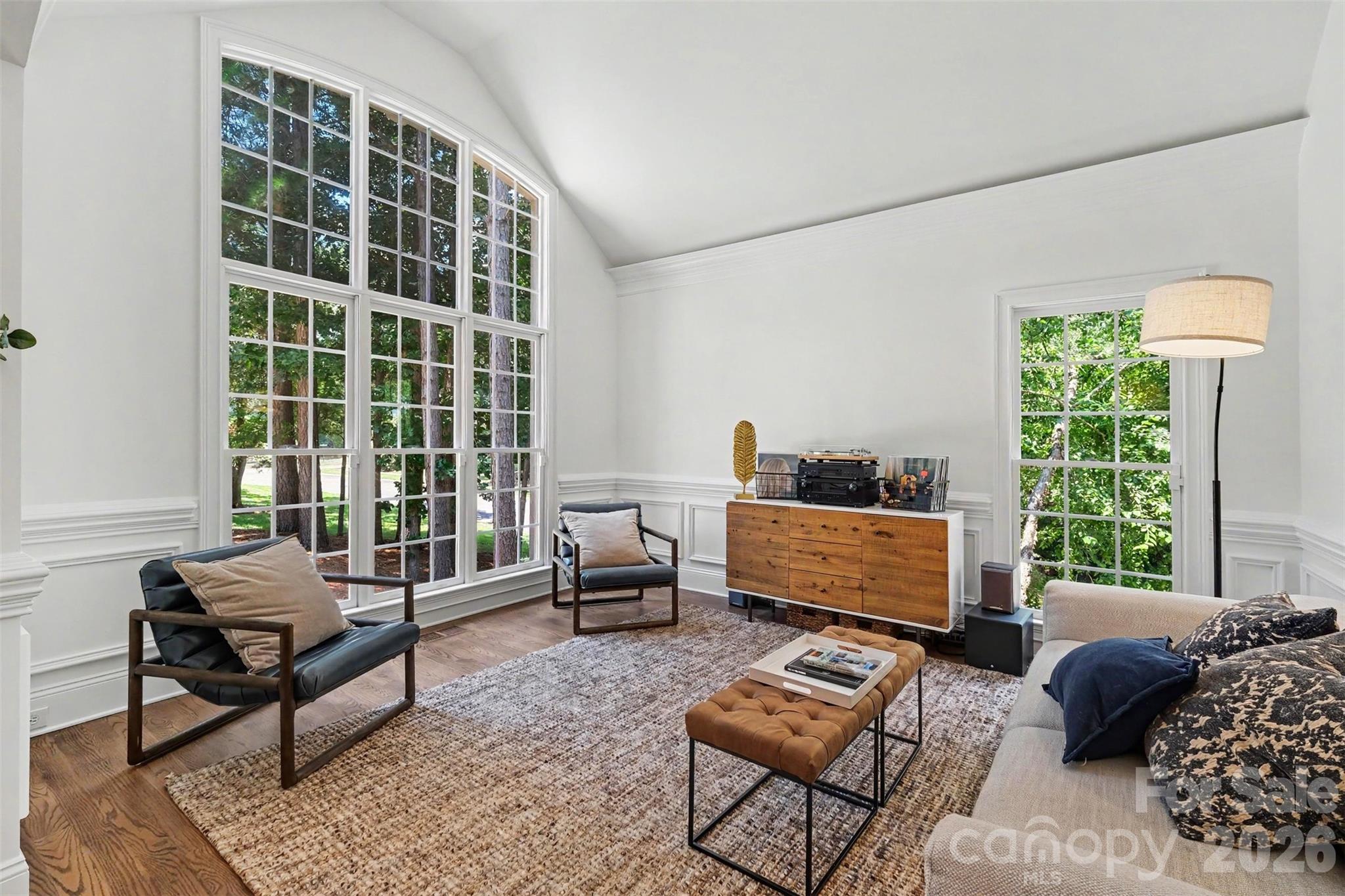 Elegant formal living room with vaulted ceiling and wall of windows. - 109 Whiterock Drive, Mount Holly
