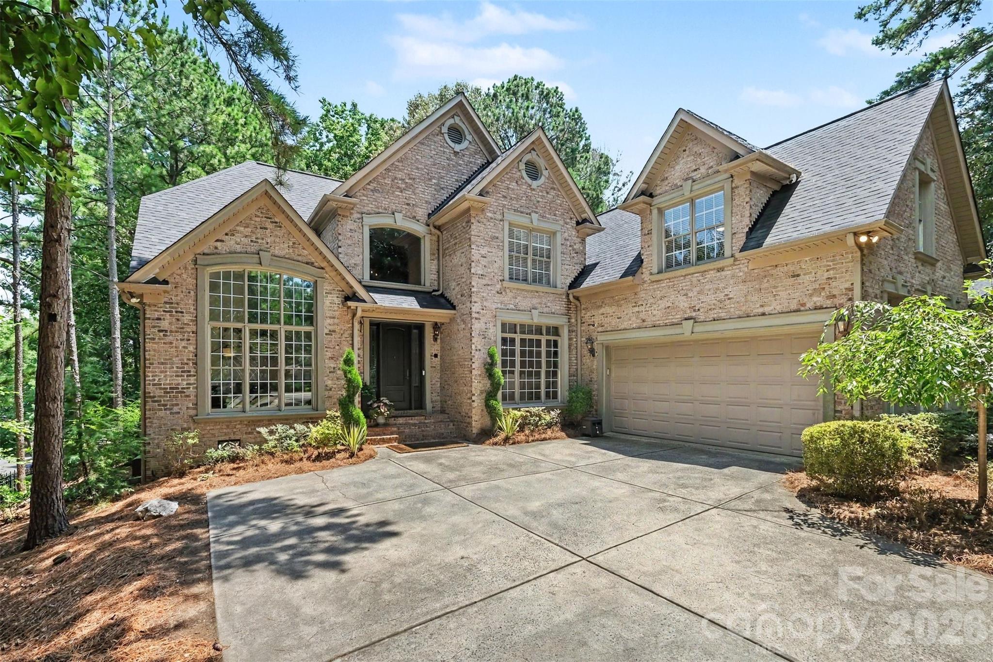 Oversized 640 sq ft 2-car courtyard garage feature built-in cabinets, work bench, and epoxy flooring - 109 Whiterock Drive, Mount Holly