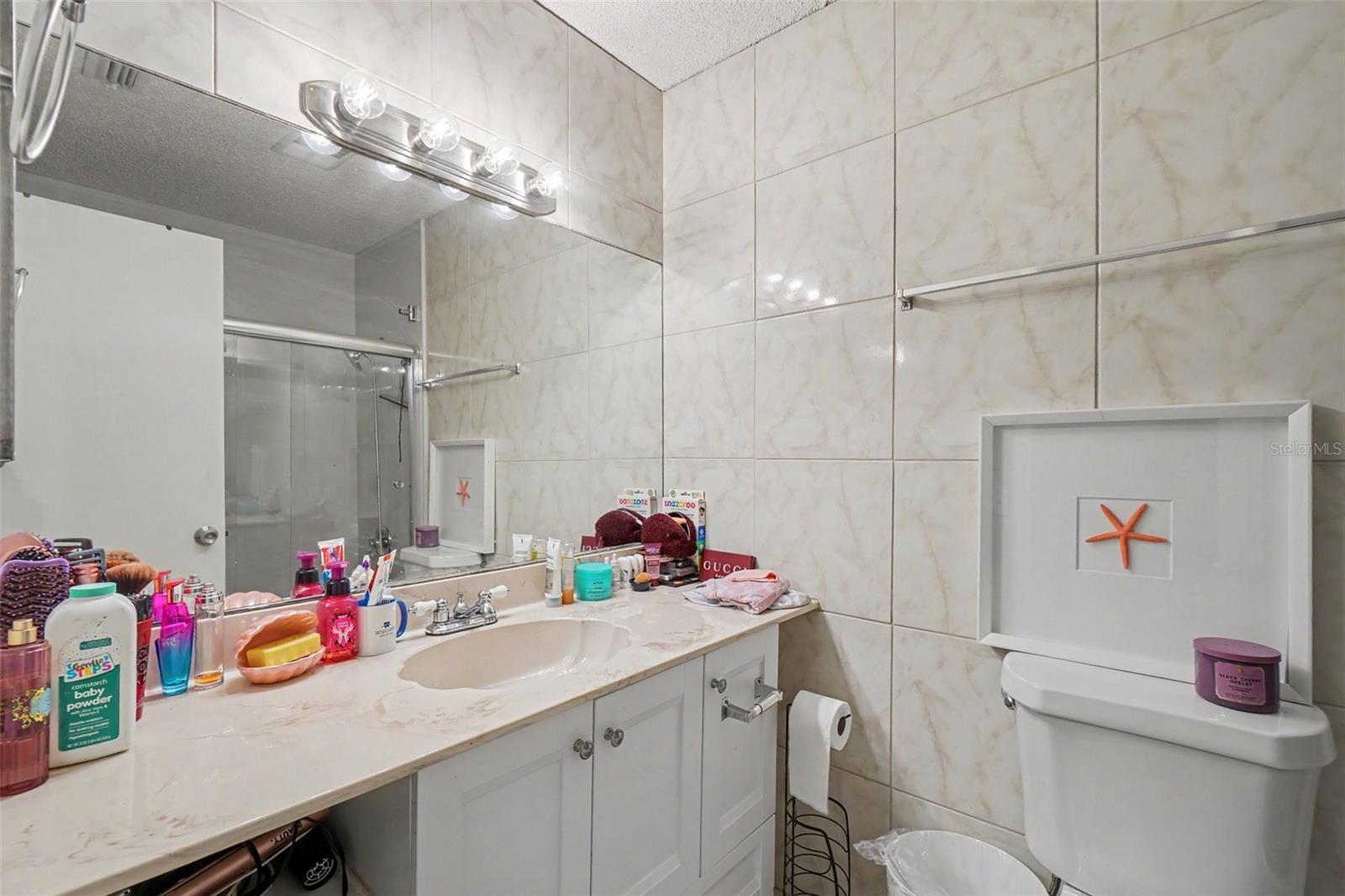 Guest bath with shower/tub combo - 13238 FOWLER AVE, PORT CHARLOTTE