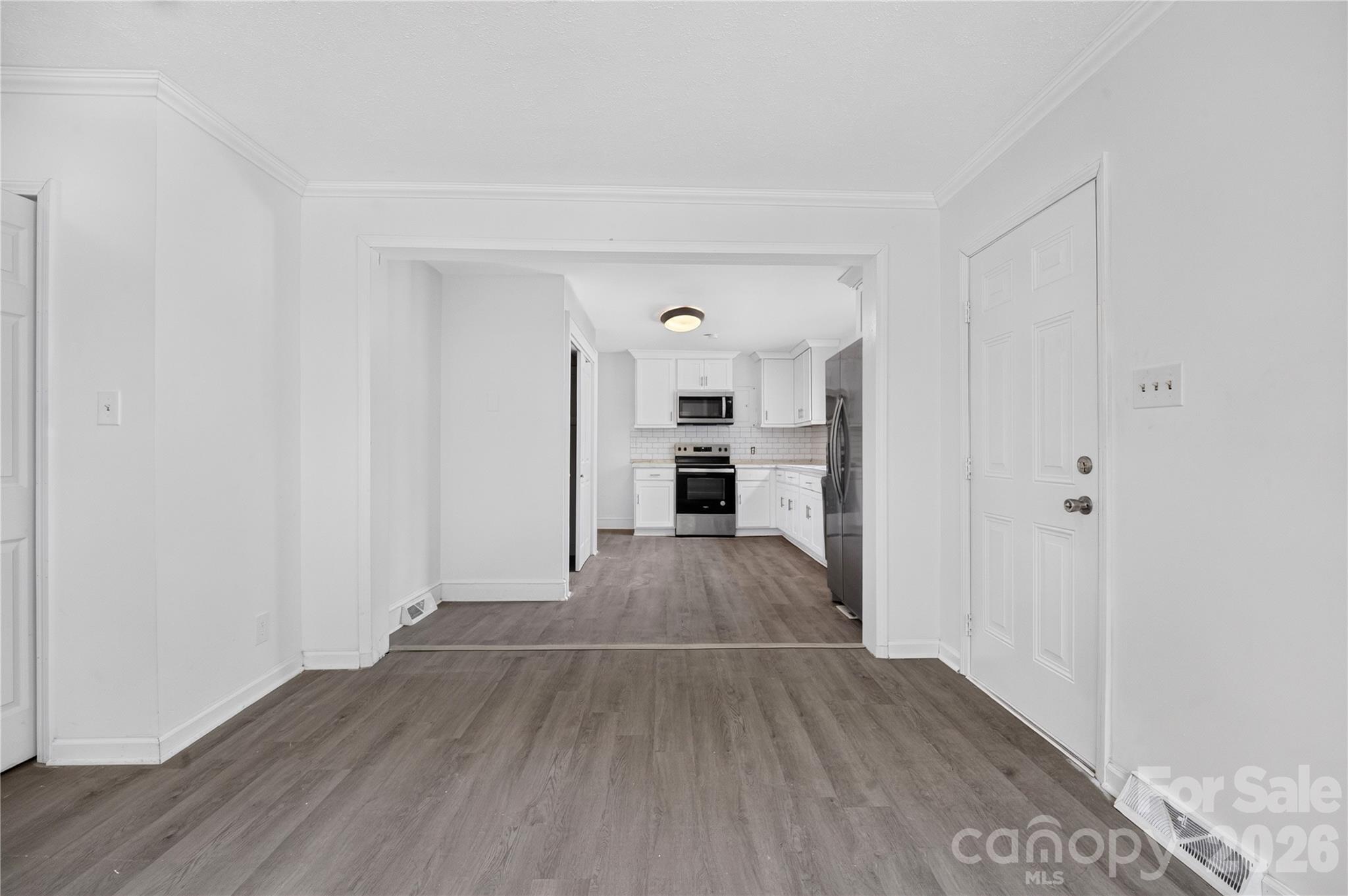 dining area and side entrance - 216 W Shannonhouse Street, Shelby