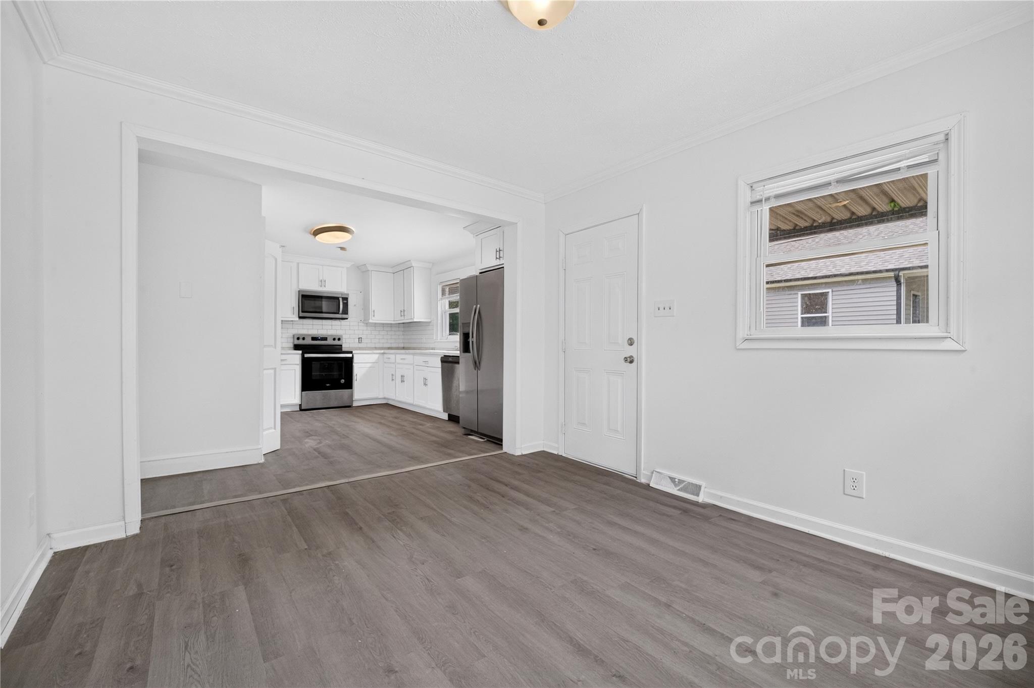 dining area, side entrance and kitchen - 216 W Shannonhouse Street, Shelby