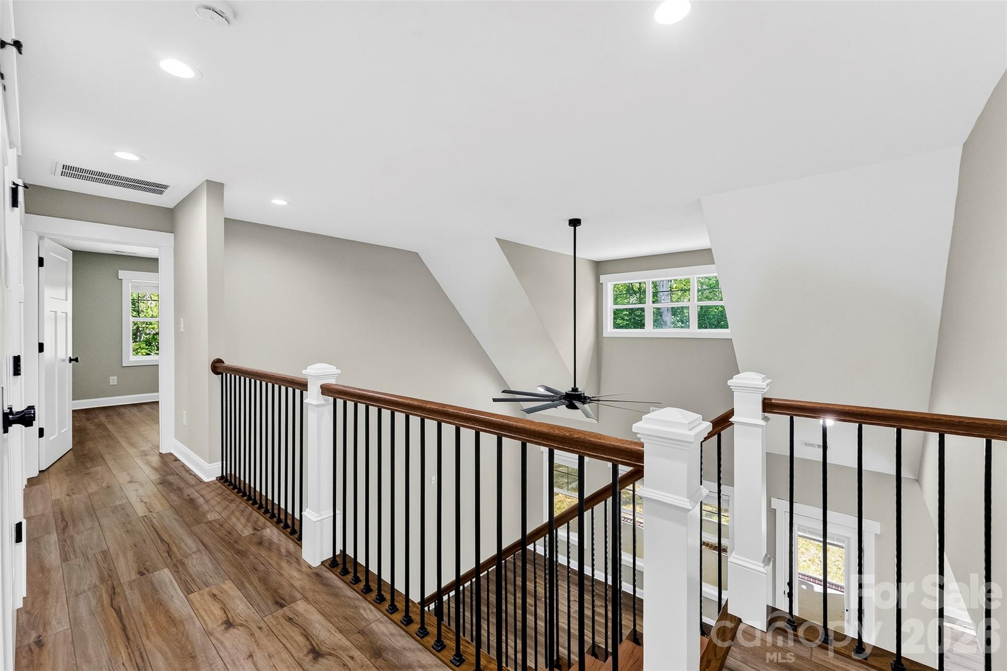 Upstairs hallway overlooking great room - 5005 Oconee Drive, Stanley