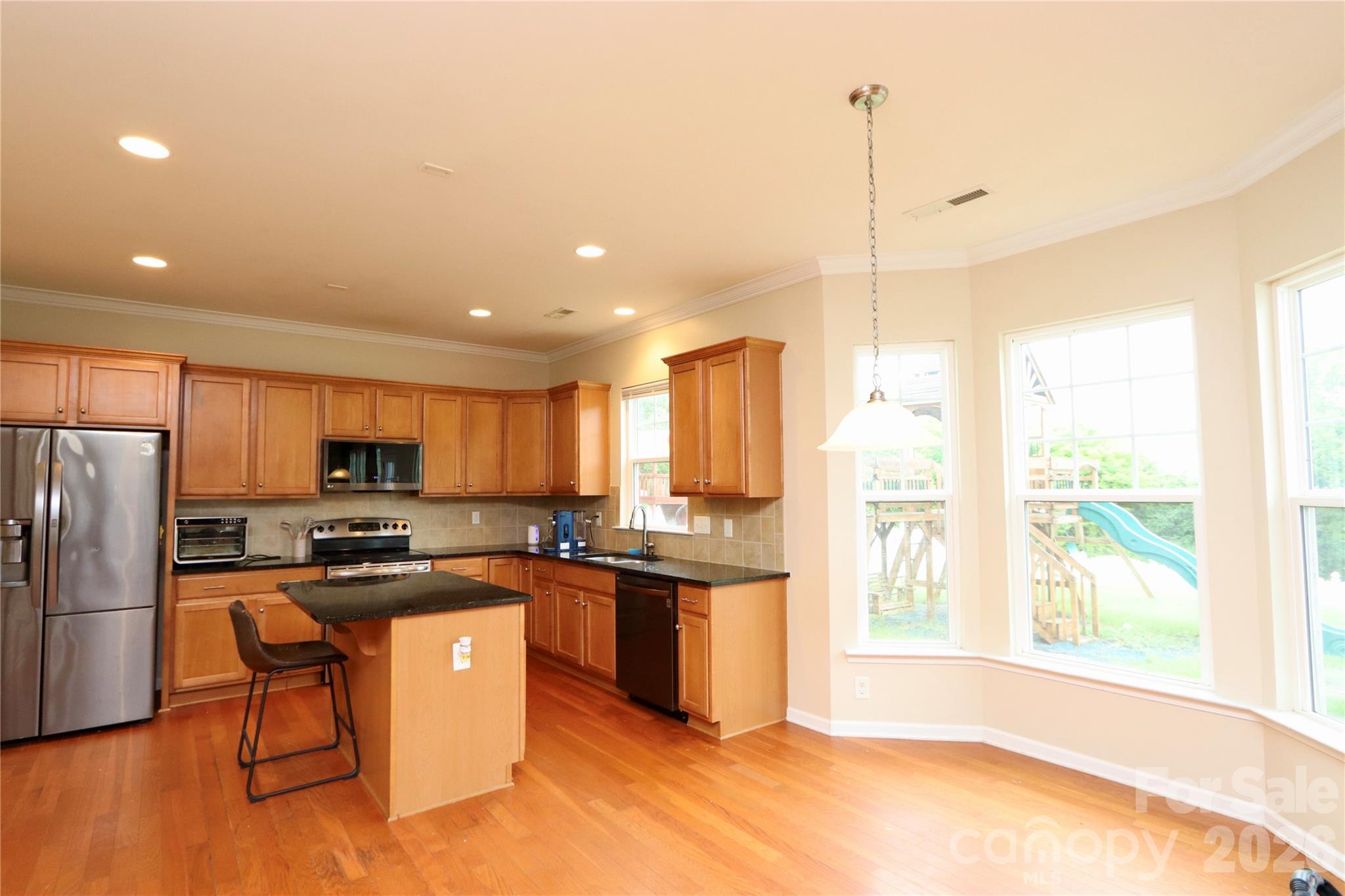 Breakfast nook area in kitchen. - 3586 Larkhaven Avenue SW, Concord