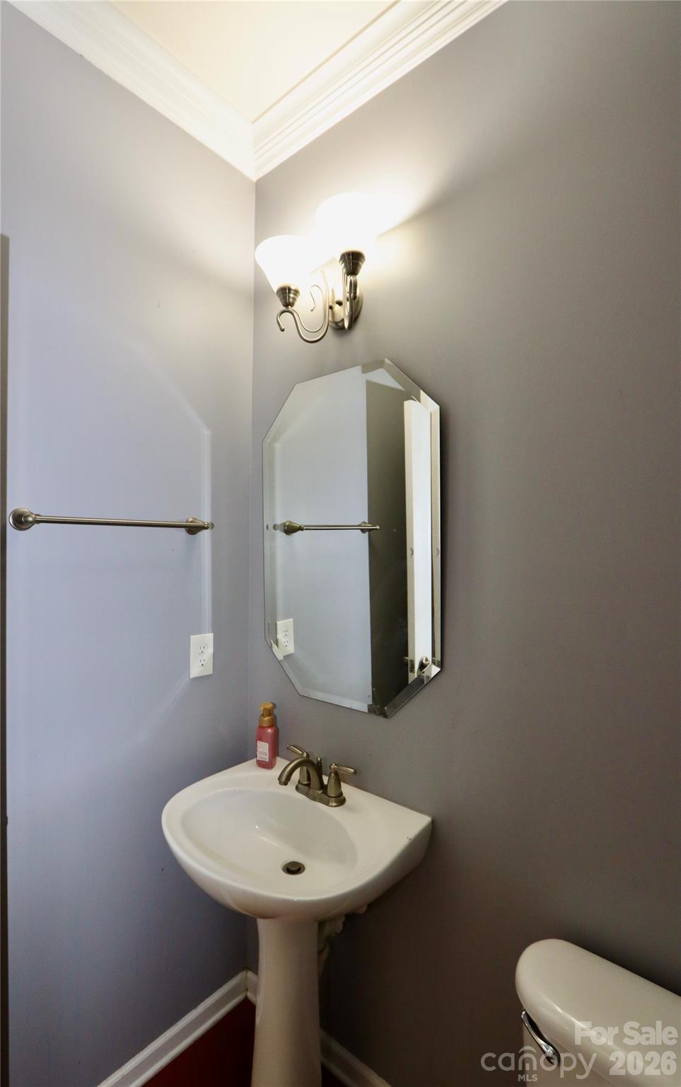 Powder room off of kitchen. - 3586 Larkhaven Avenue SW, Concord
