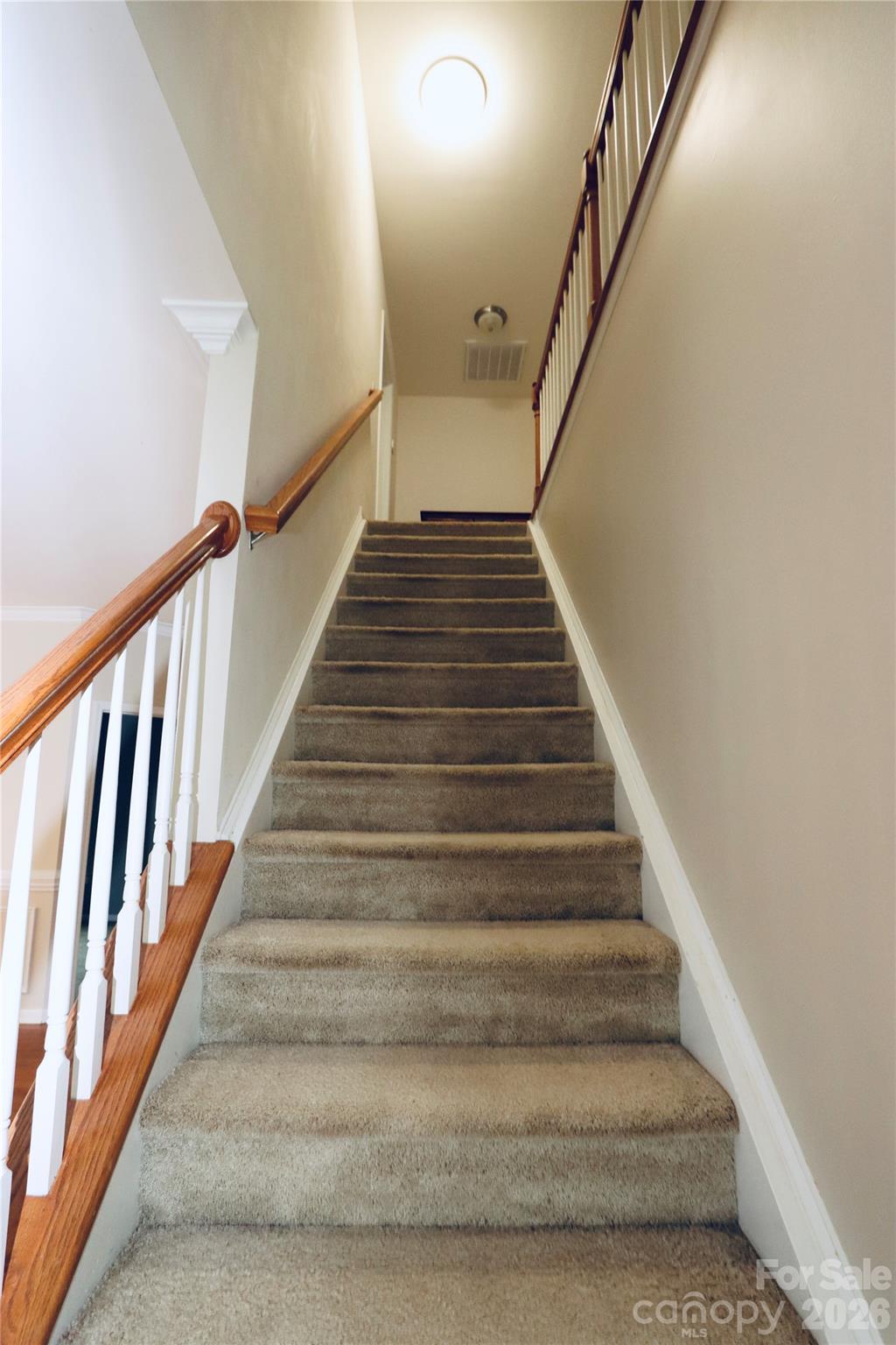 Center stairs to 4 bedrooms upstairs - 3586 Larkhaven Avenue SW, Concord