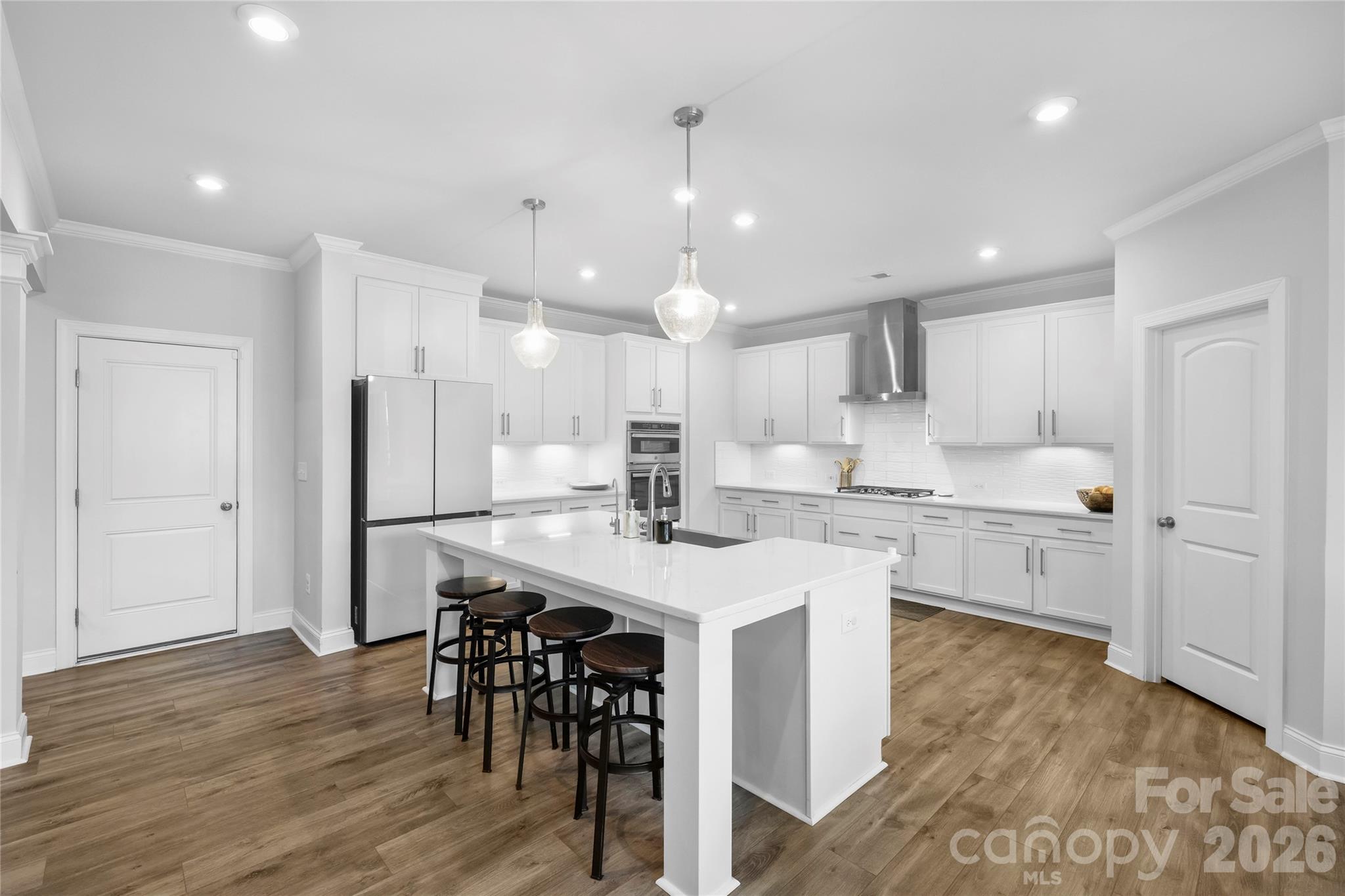 A kitchen designed for conversation. - 1402 Ashe Meadow Drive, Indian Trail