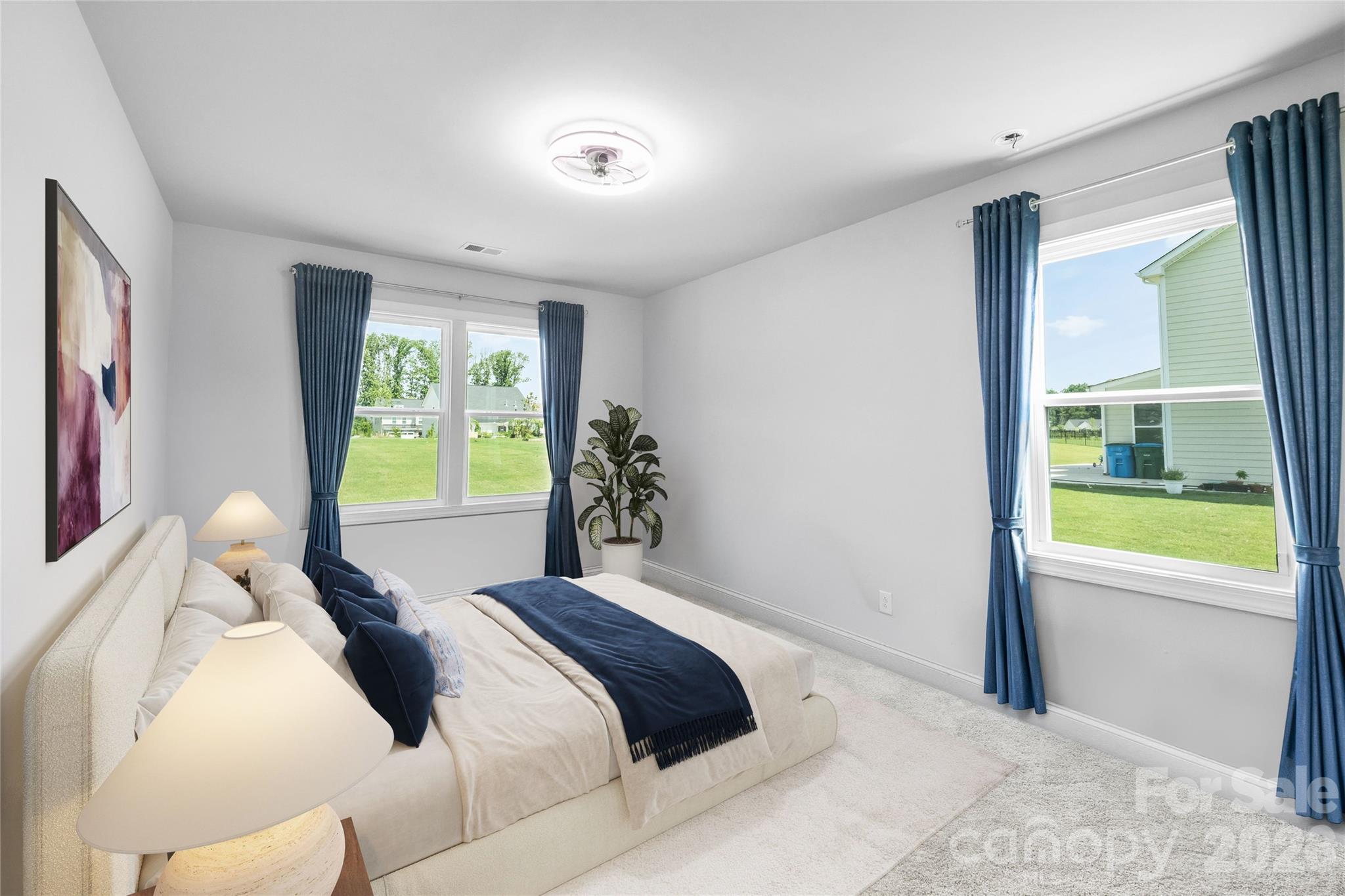 Main-level guest suite for family or overnight visitors. - 1402 Ashe Meadow Drive, Indian Trail