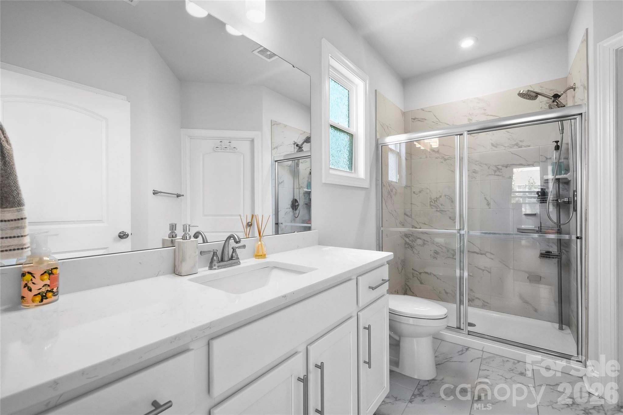 Private ensuite bath for added comfort. - 1402 Ashe Meadow Drive, Indian Trail