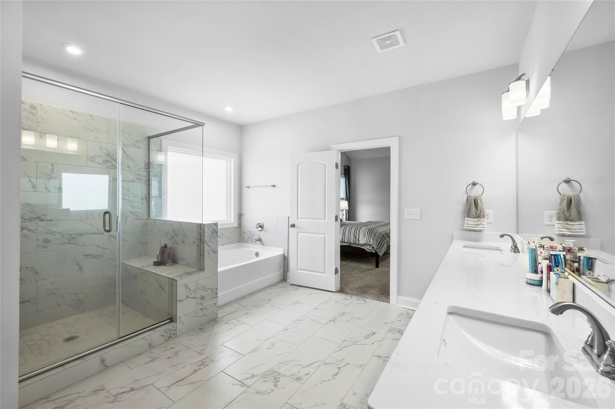 A spa-inspired bath you'll appreciate every day. - 1402 Ashe Meadow Drive, Indian Trail