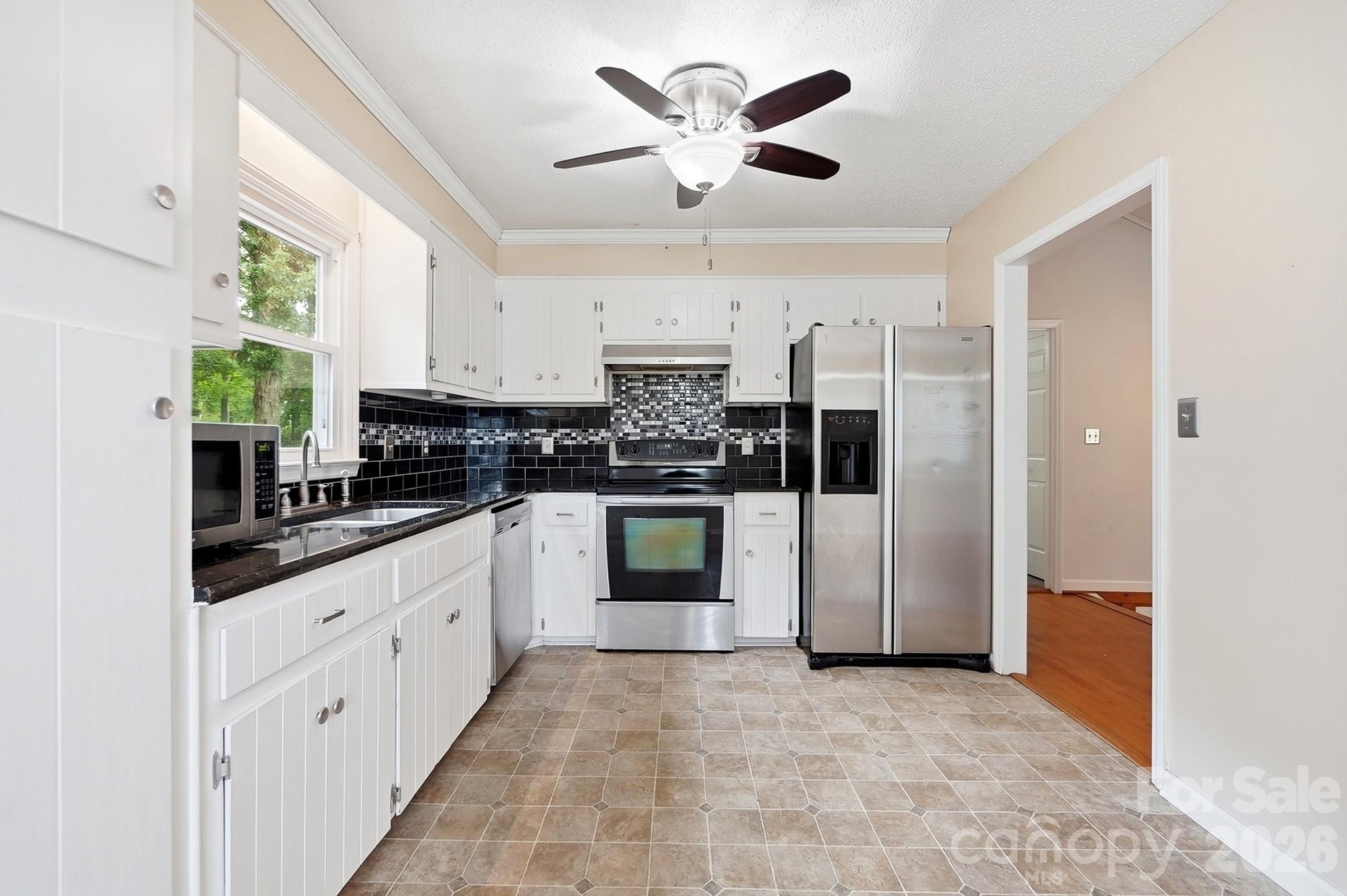 Yes, the refrigerator conveys - 2600 Providence Drive, Gastonia