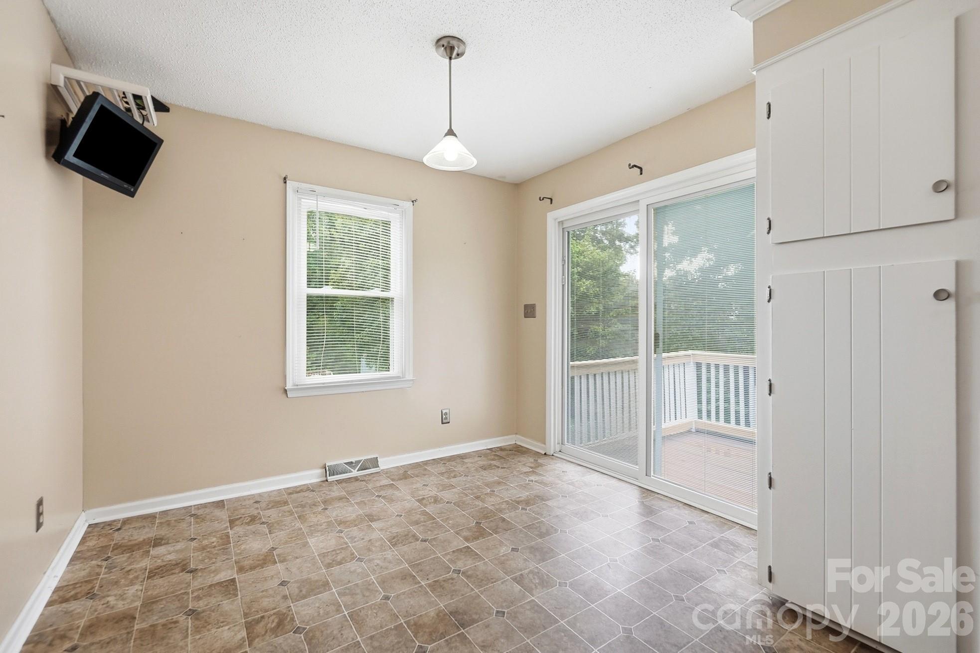 Access the large deck from the breakfast area - 2600 Providence Drive, Gastonia