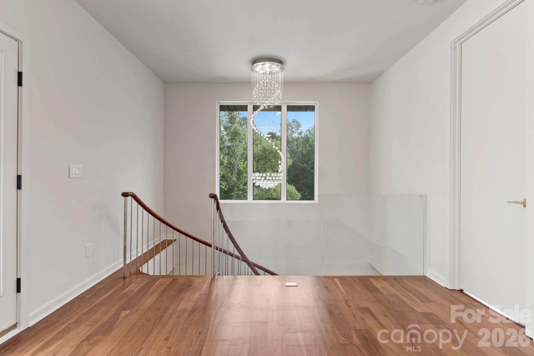 Second-floor loft/bonus room with private access to the rooftop terrace - 1064 Greylyn Drive, Matthews