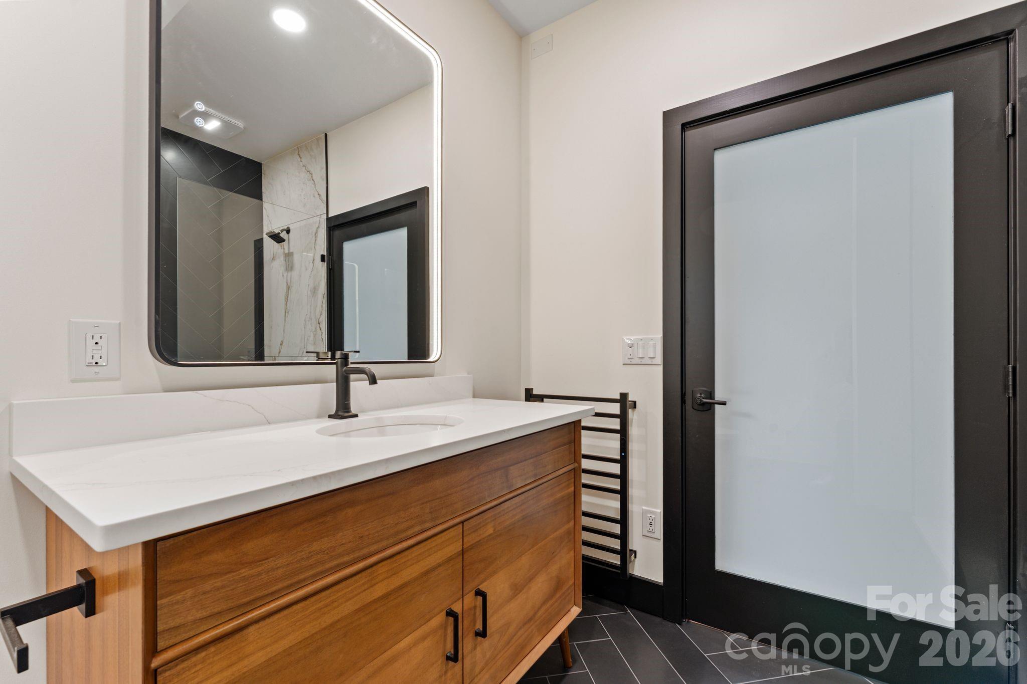 Garage guest suite en-suite full bathroom - 1064 Greylyn Drive, Matthews
