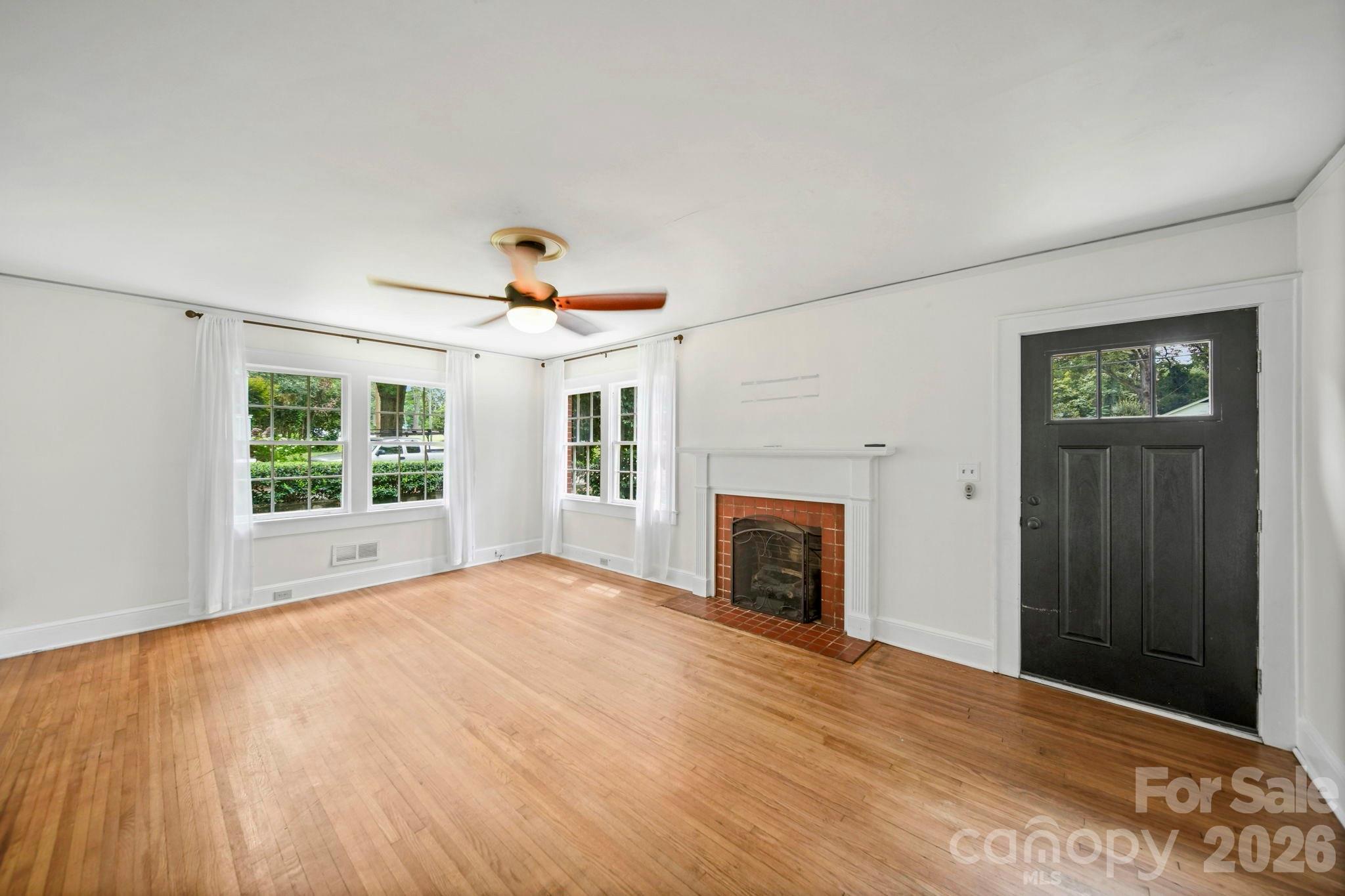Living room with ventless fireplace - 1214 S York Street, Gastonia
