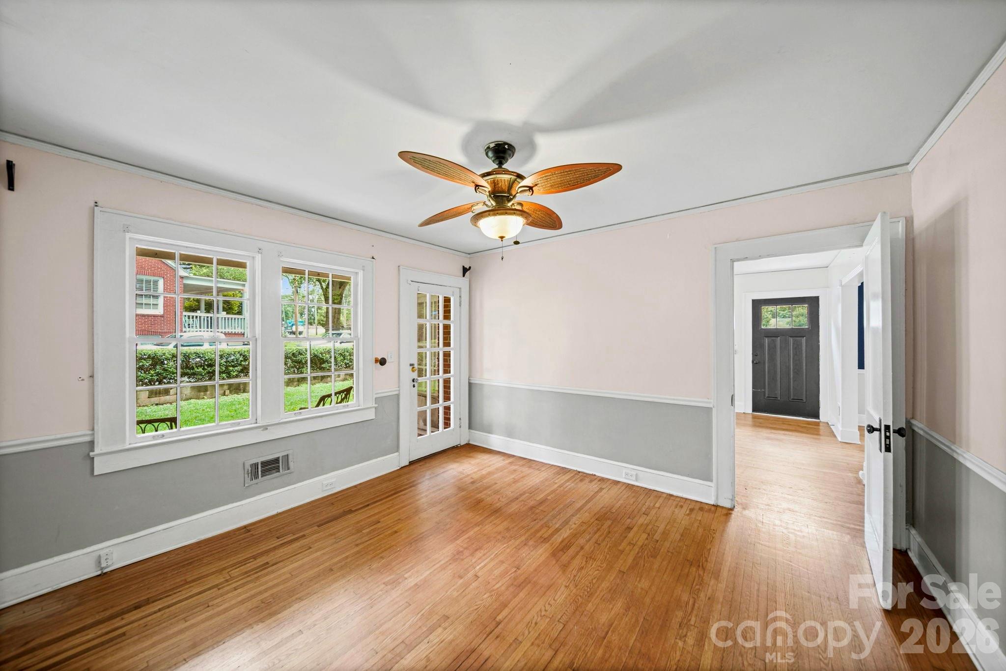 Flex space- leads to side porch & has doorway to living room and hallway - 1214 S York Street, Gastonia