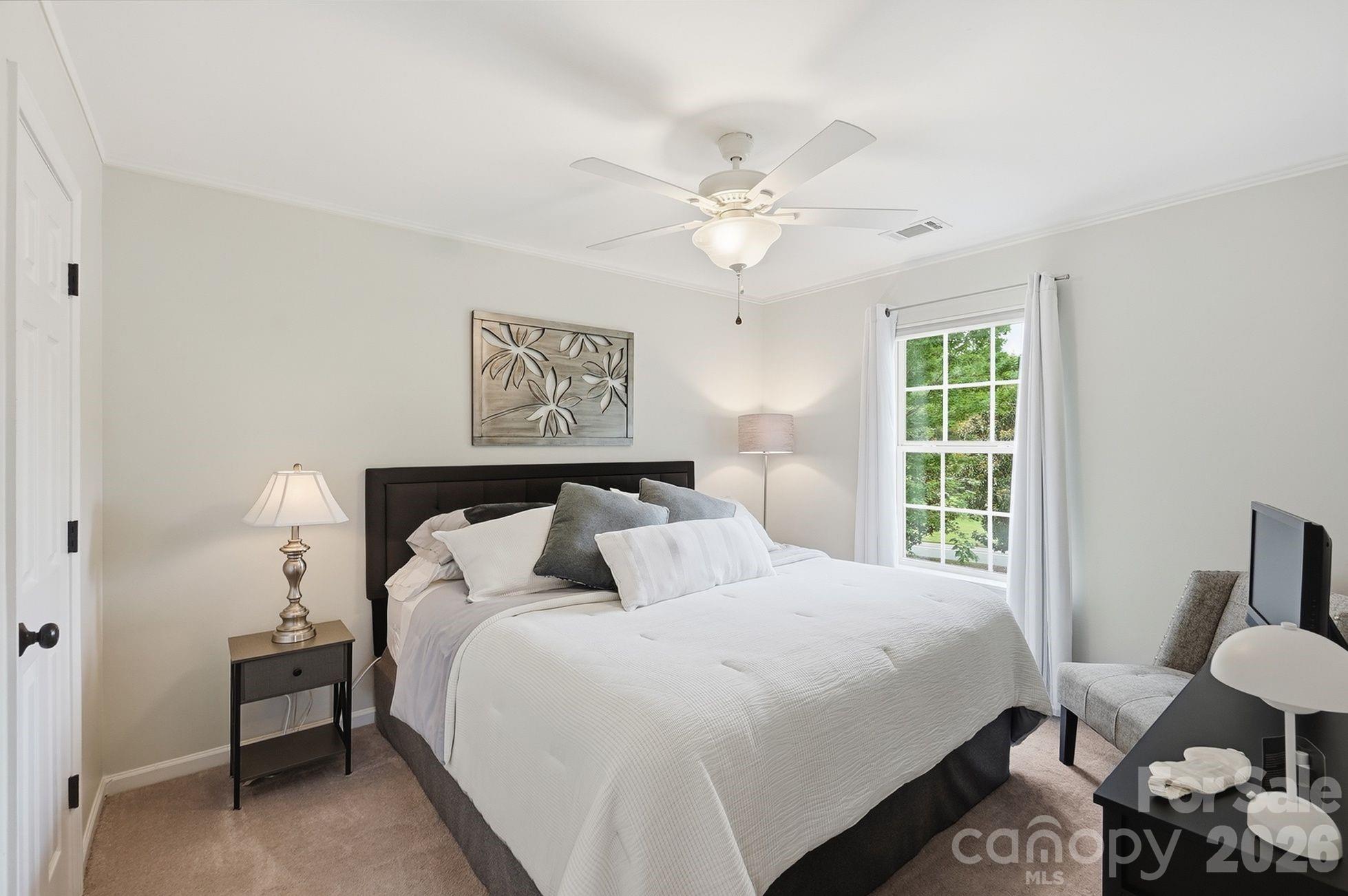 Guest Bedroom on upper level with walk-in closet - 203 Tail Race Lane, Fort Mill