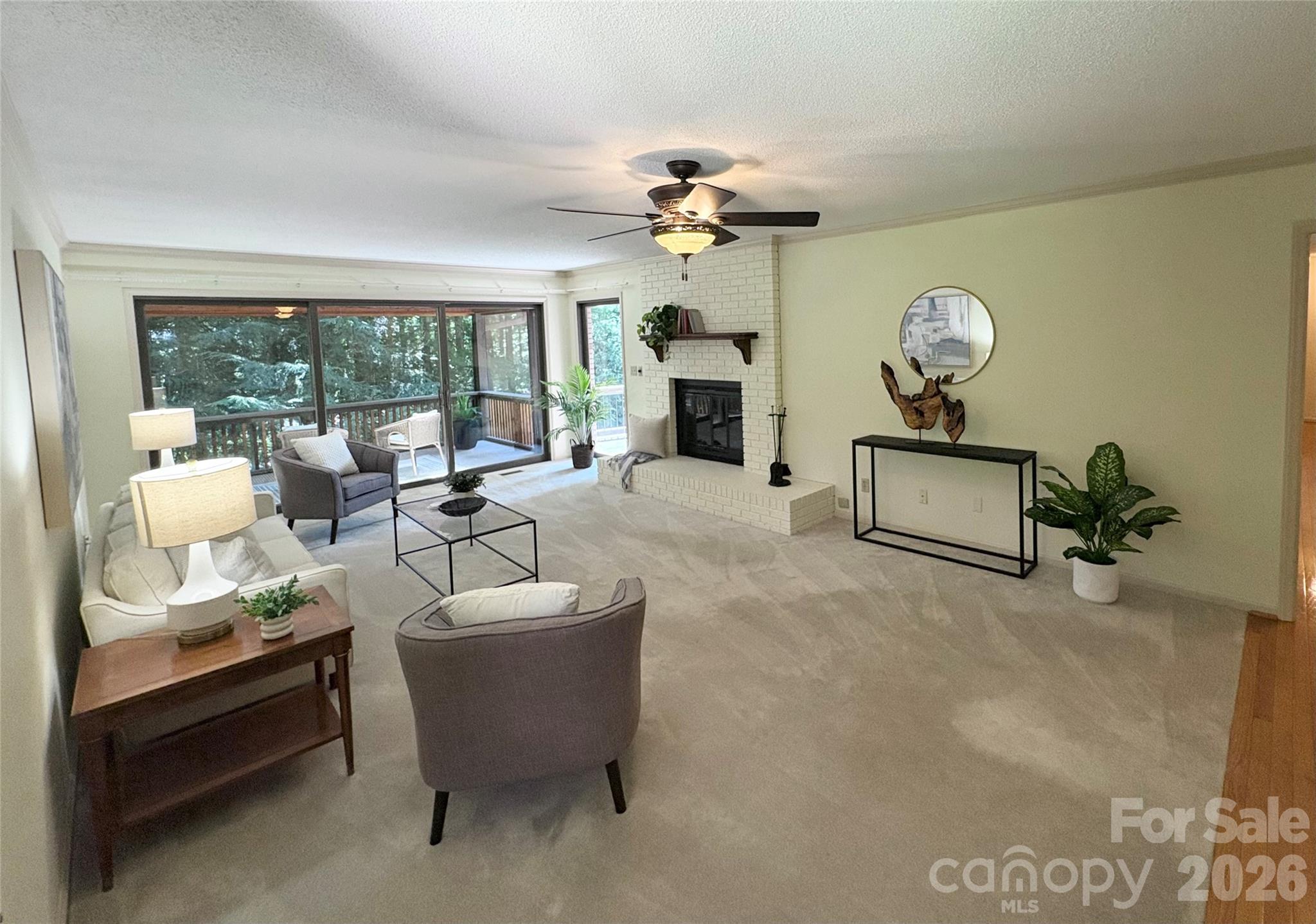 main level Family room with wood burning fireplace - 115 Woodhaven Drive, Hendersonville